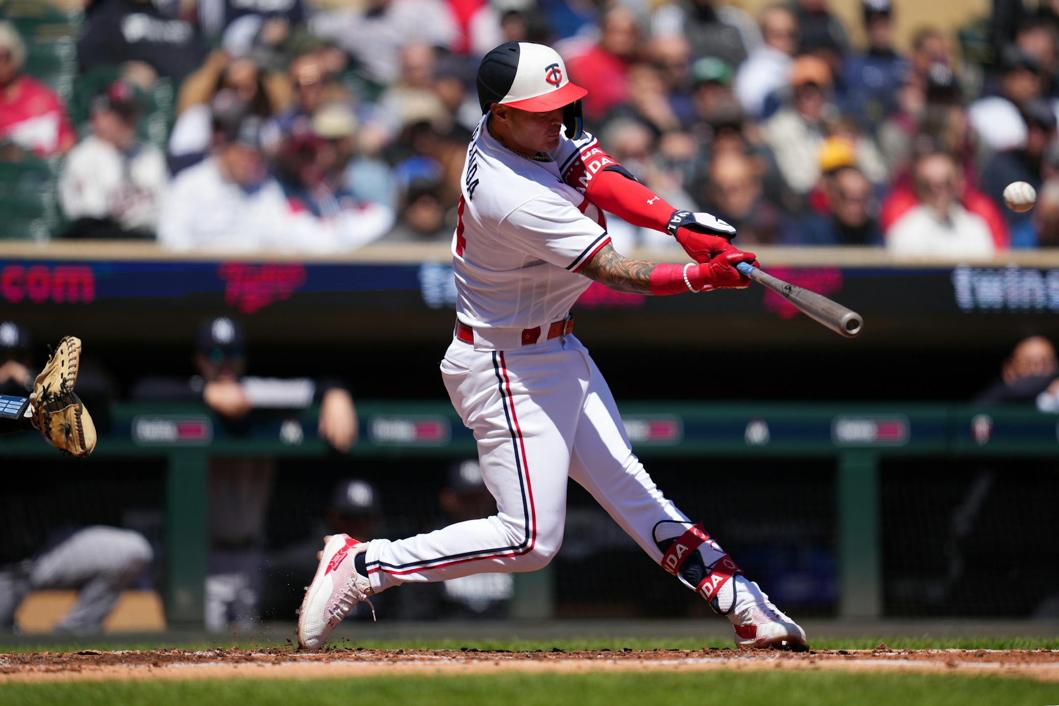 Minnesota Twins third baseman Jose Miranda (64) hits a solo home run in the second inning.