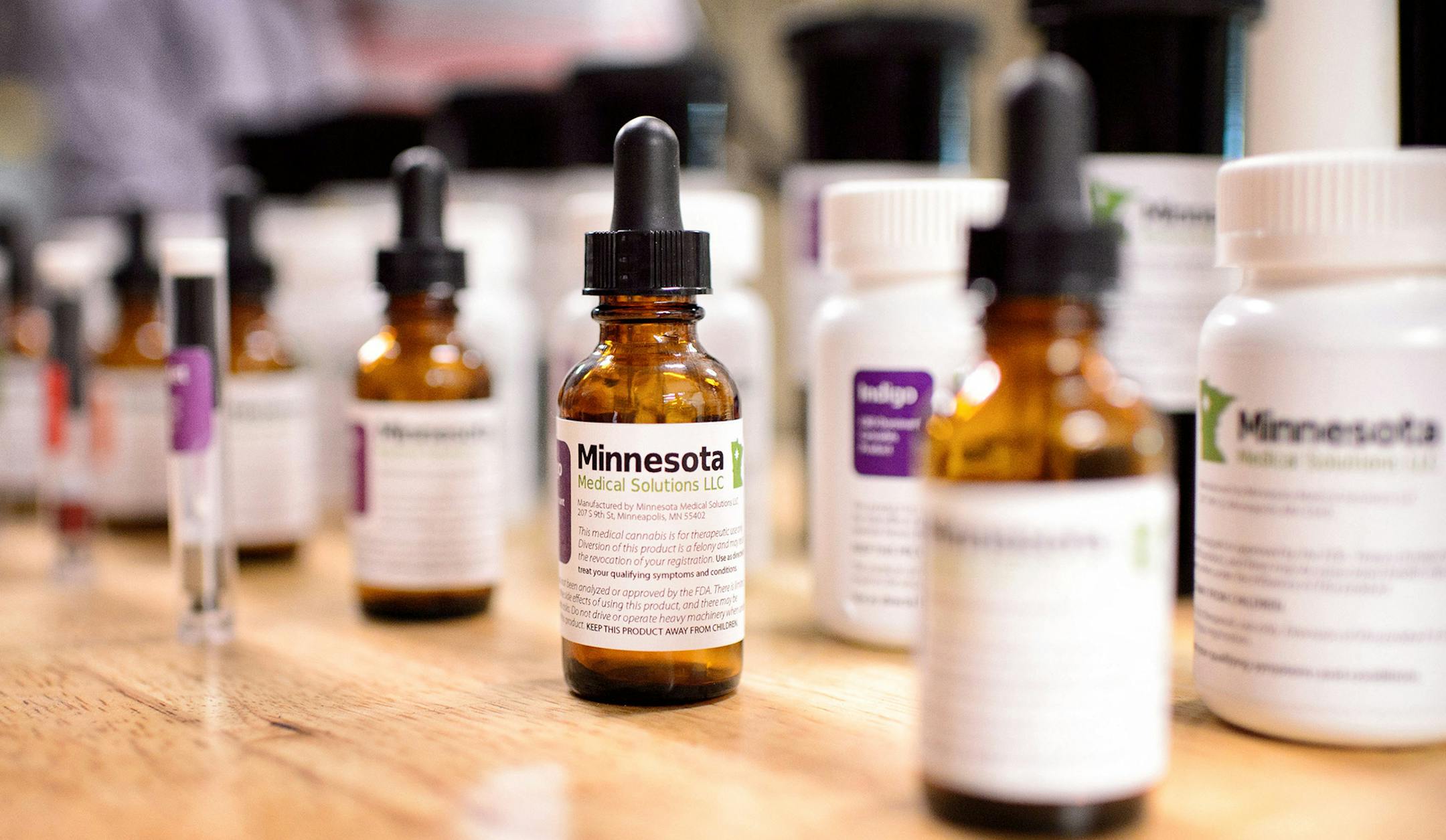 ADVANCE FOR MONDAY JUNE 1 - FILE - In this photo taken Tuesday, May 5, 2015, samples of what the final Minnesota Medical Solutions medicinal cannabis will look like are displayed in Otsego, Minn. The crop is coming in at Minnesota Medical Solutions, one of two manufacturers who will be supplying the state's medical marijuana. Some health care providers are sitting out completely while others are ready to start certifying patients. (AP Photo,Star Tribune,Glen Stubbe,File) MANDATORY CREDIT; ST. PA