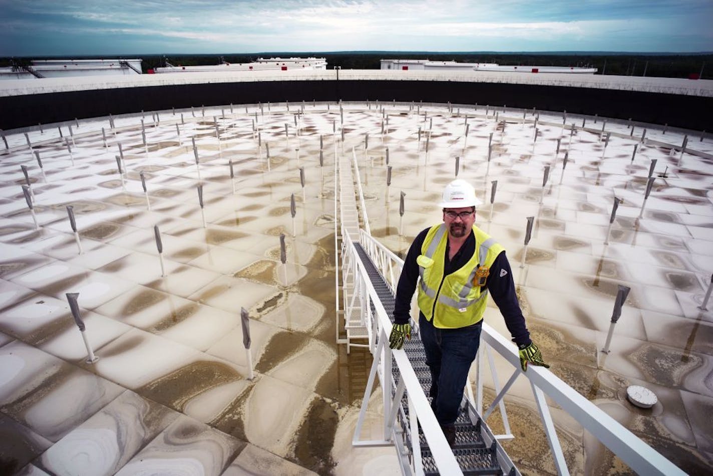 Tom Peterson, supervisor of the Enbridge terminal site shows where oil from Canada and North Dakota is stored and is directed to its final destination.