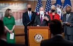 Speaker of the House Nancy Pelosi, D-Calif., left, is joined at a news conference by members of the Democratic Caucus, from left, Rep. Sean Patrick Ma