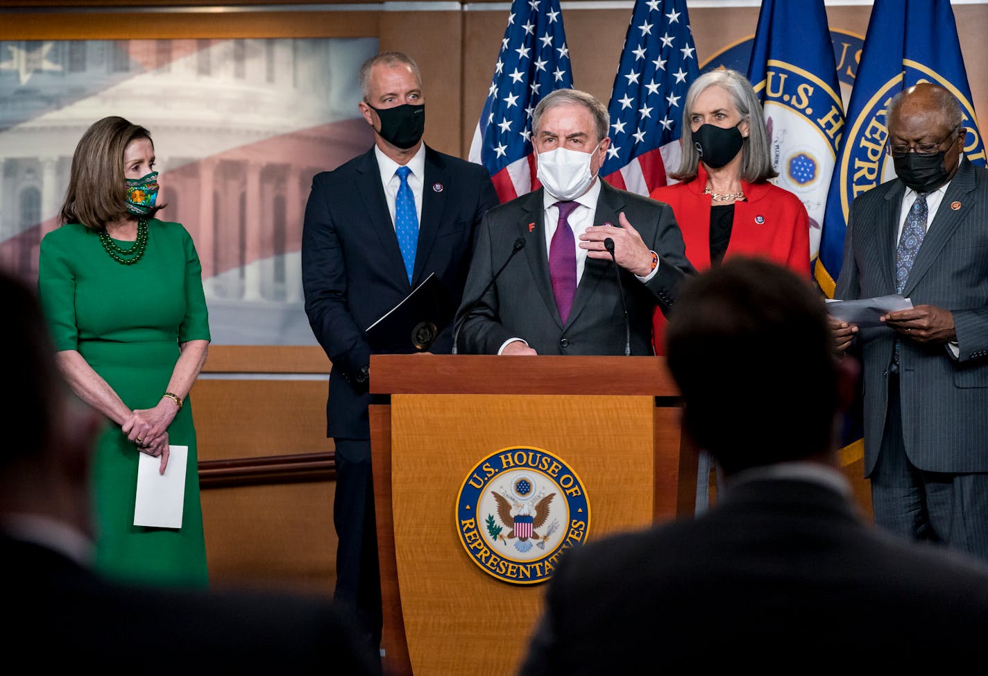 Speaker of the House Nancy Pelosi, D-Calif., left, is joined at a news conference by members of the Democratic Caucus, from left, Rep. Sean Patrick Maloney, D-NY, House Budget Committee Chairman John Yarmuth, D-Ky., Rep. Katherine Clark, D-Mass., and Majority Whip James Clyburn, D-S.C., before a vote on a $1.9 trillion pandemic relief package, at the Capitol in Washington, Friday, Feb. 26, 2021. (AP Photo/J. Scott Applewhite)