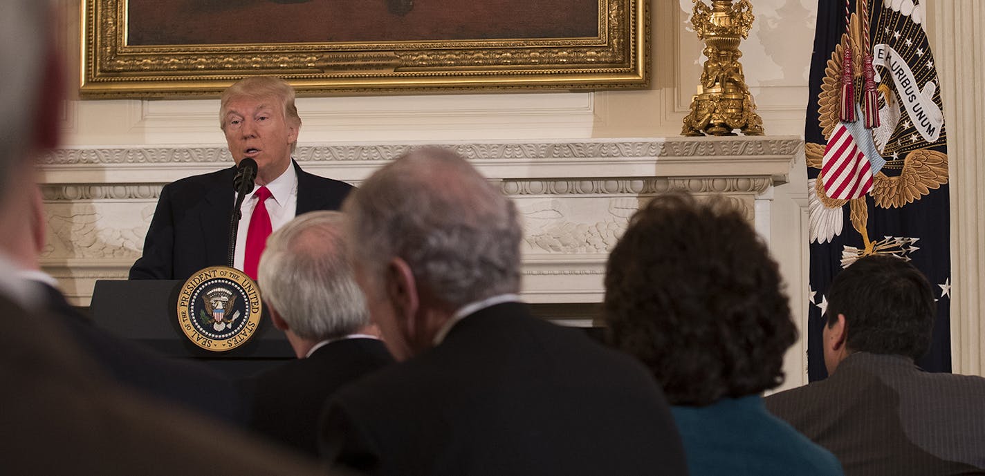 President Donald Trump speaks about budget policy during a meeting of National Governors Association in State Dining Room of the White House, in Washington, Feb. 27, 2017. Also pictured at far right: Vice President Mike Pence. (Stephen Crowley/The New York Times) ORG XMIT: MIN2017030612091918