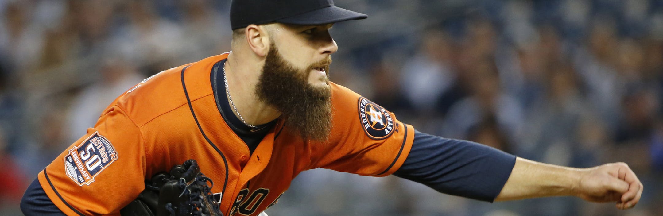 Houston Astros starting pitcher Dallas Keuchel follows through in the first inning of a baseball game against the New York Yankees at Yankee Stadium in New York, Tuesday, Aug. 25, 2015. (AP Photo/Kathy Willens) ORG XMIT: OTKKW103