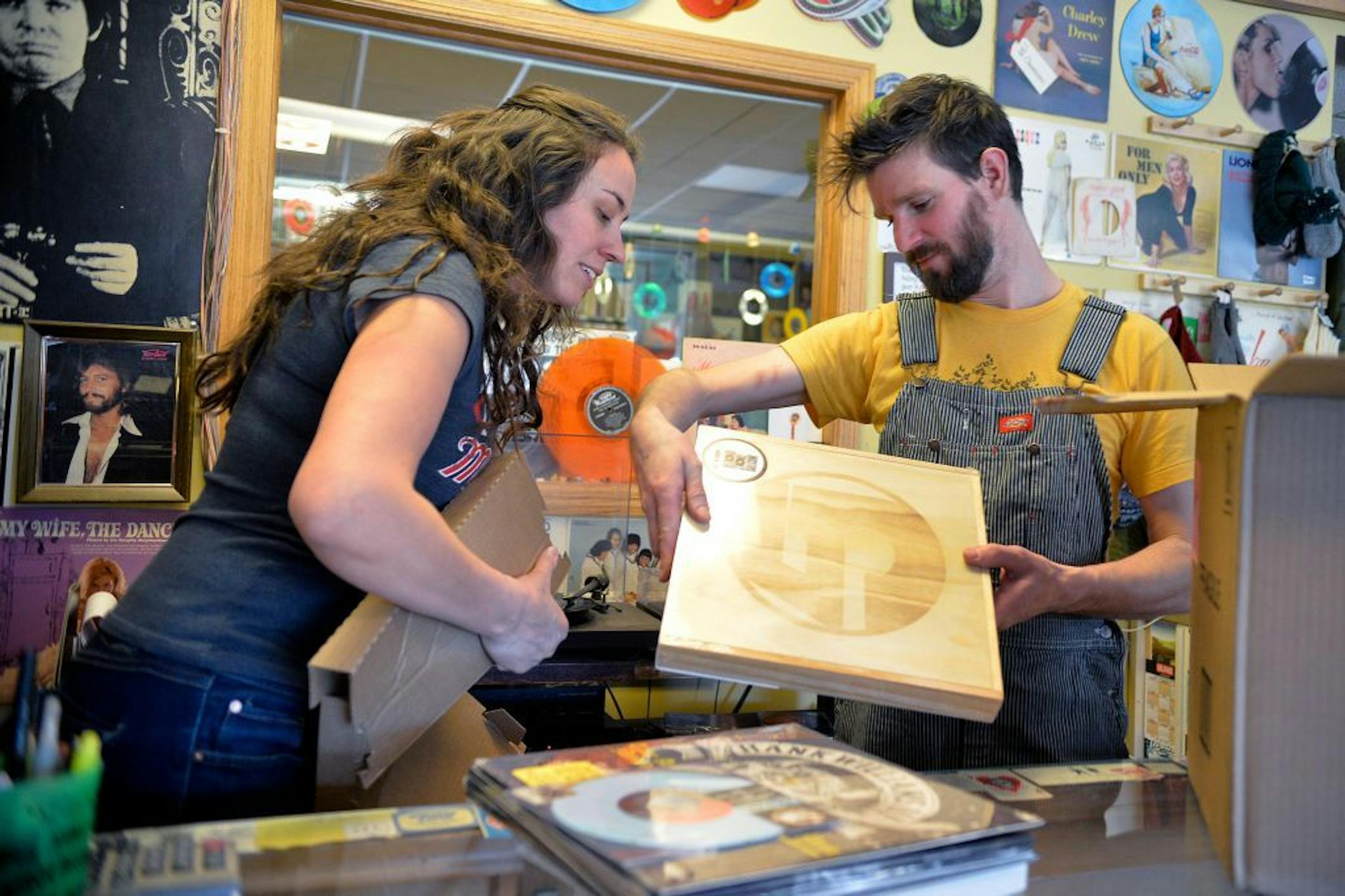 Hymie's Vintage Records owners Laura and Dave Hoenack unpack special limited edition Record Store Day releases in preparation for Hymie's Record Store Day Block Party.