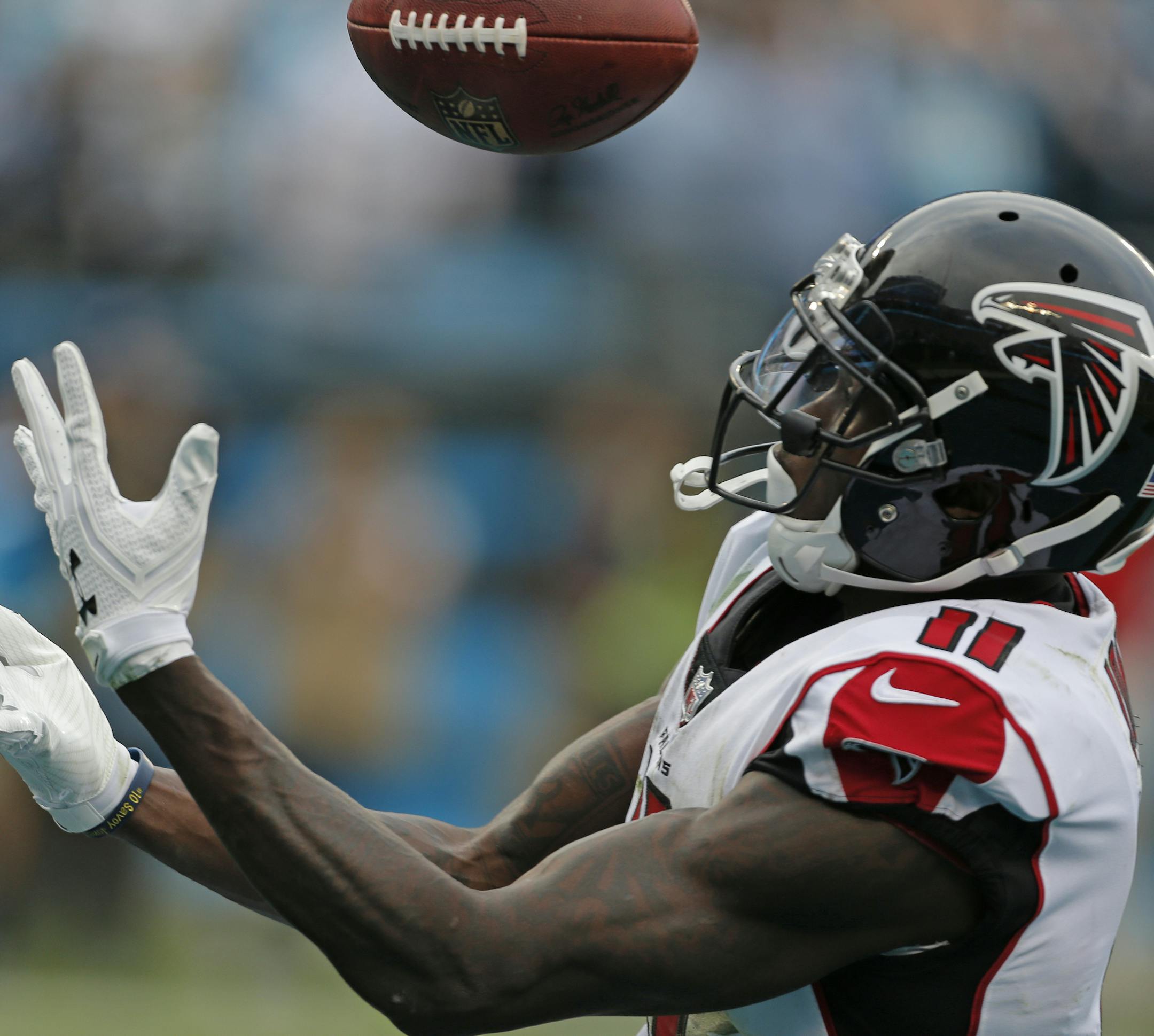 Atlanta Falcons' Julio Jones (11) misses a touchdown catch against the Carolina Panthers in the second half of an NFL football game in Charlotte, N.C., Sunday, Nov. 5, 2017. (AP Photo/Bob Leverone)