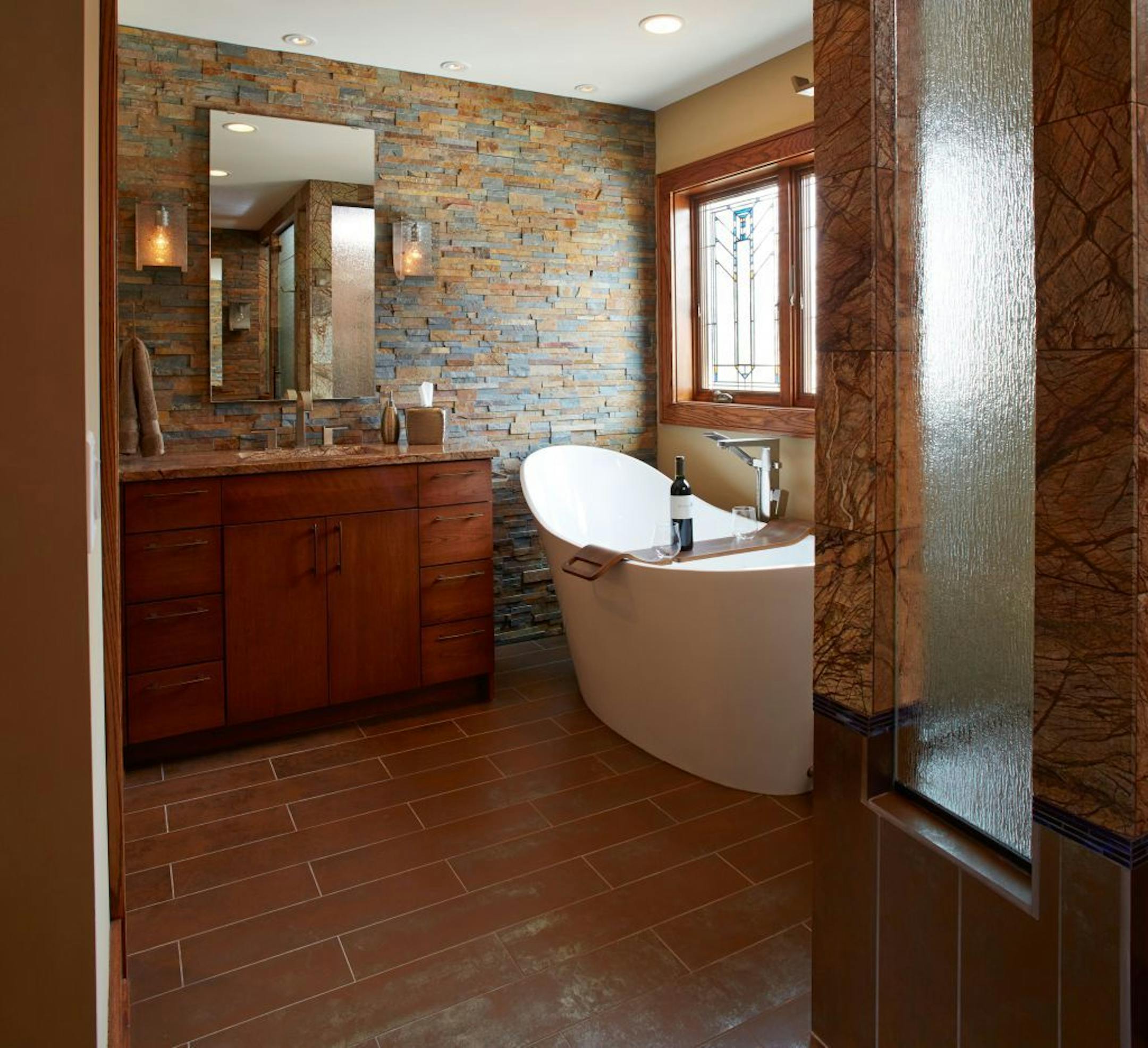 Before and After - master bathroom makeover by White Crane Construction. Credit Jill Greer