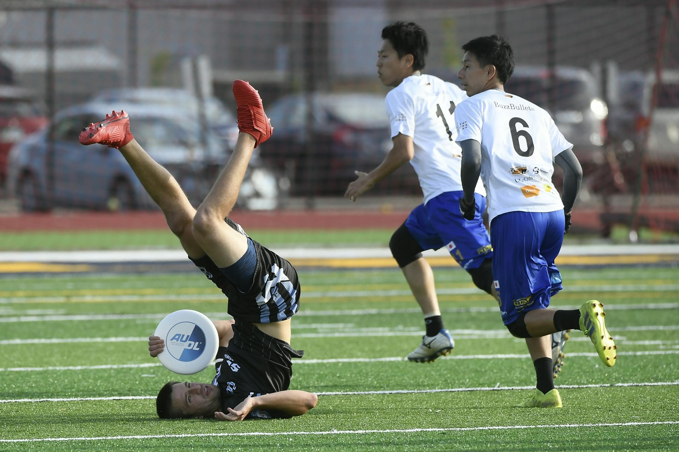 The Minnesota Wind Chill's Raheem Ishaque was upended after making a leaping catch against the Buzz Bullets.