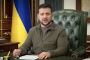In this image from video provided by the Ukrainian Presidential Press Office and posted on Facebook, Ukrainian President Volodymyr Zelenskyy speaks in