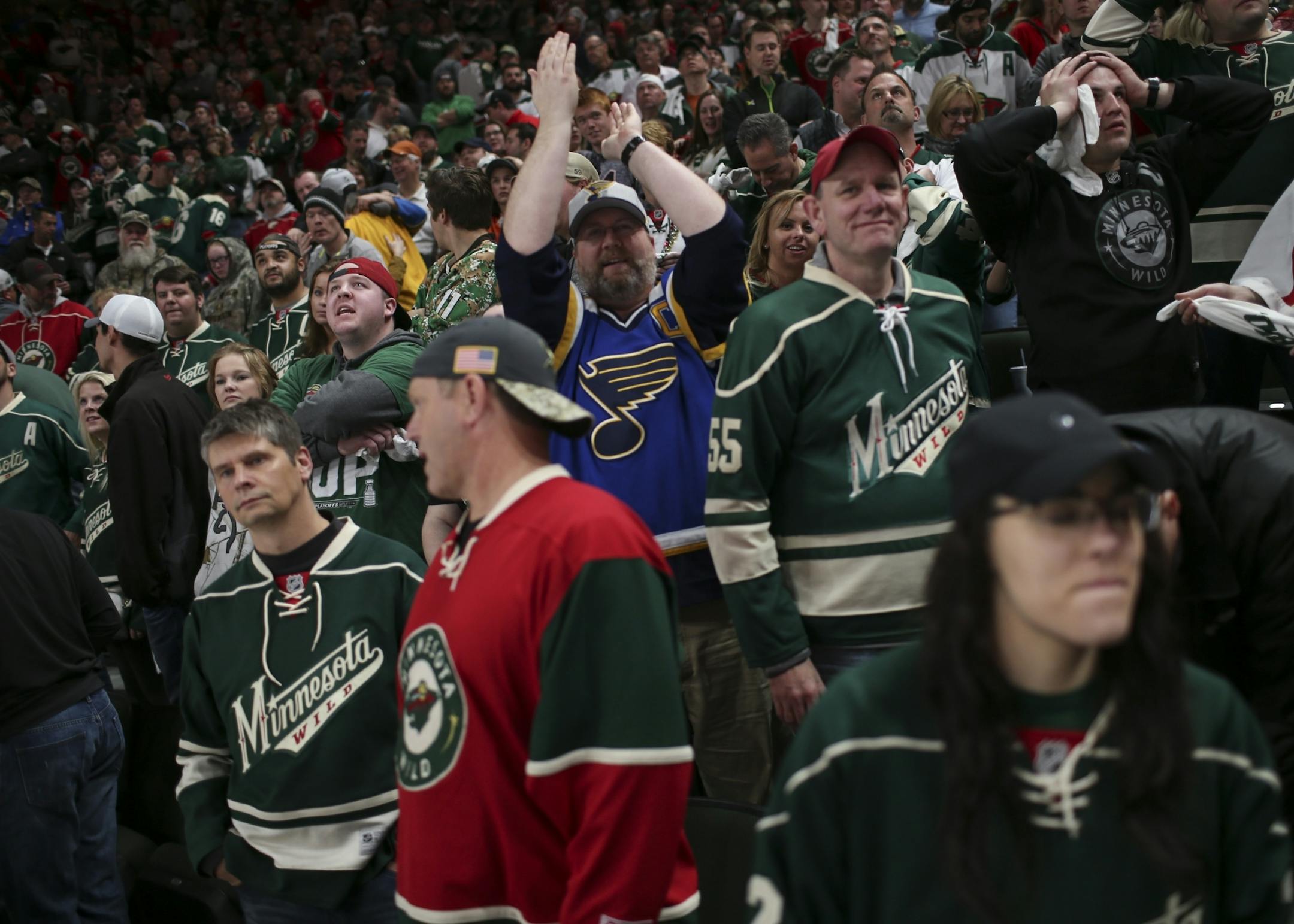 Wild fans were glum when St. Louis pulled off a 2-1 overtime win in Game 1 of their series.