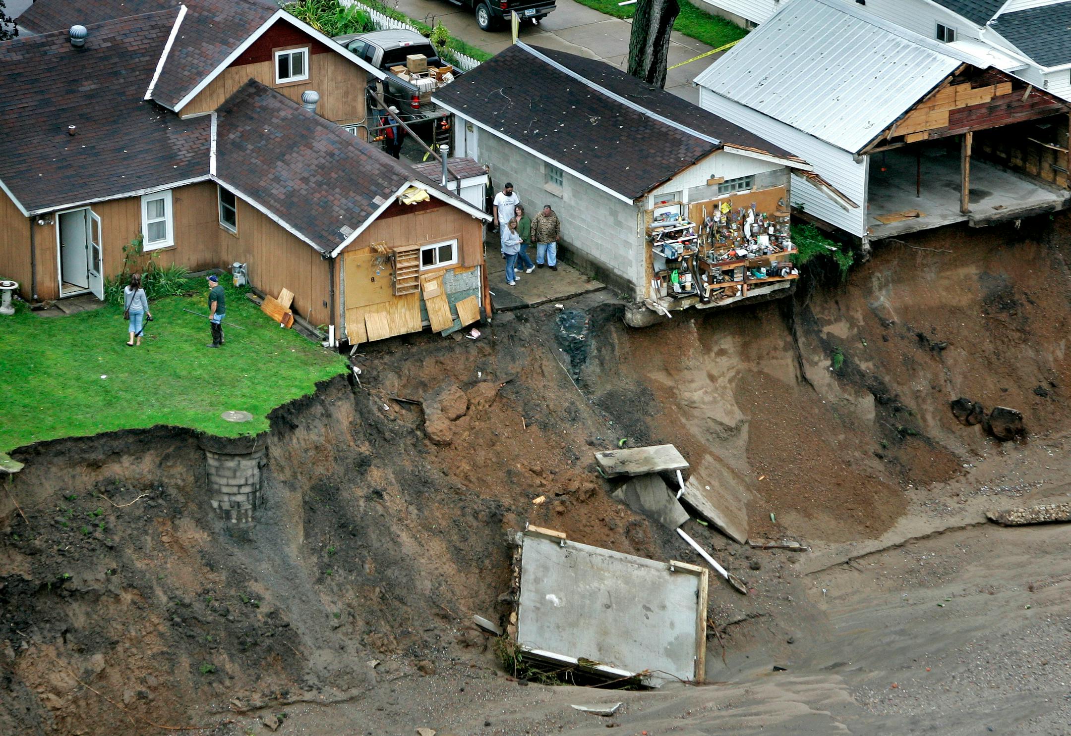 A view of the destruction in August along Garvin Brook in Minnesota City, Minn. Facing an estimated $67 million in property damage, flood victims are eligible for loans to rebuild, but DFL senators on Friday said that too much red tape and other roadblocks are keeping victims from getting aid.