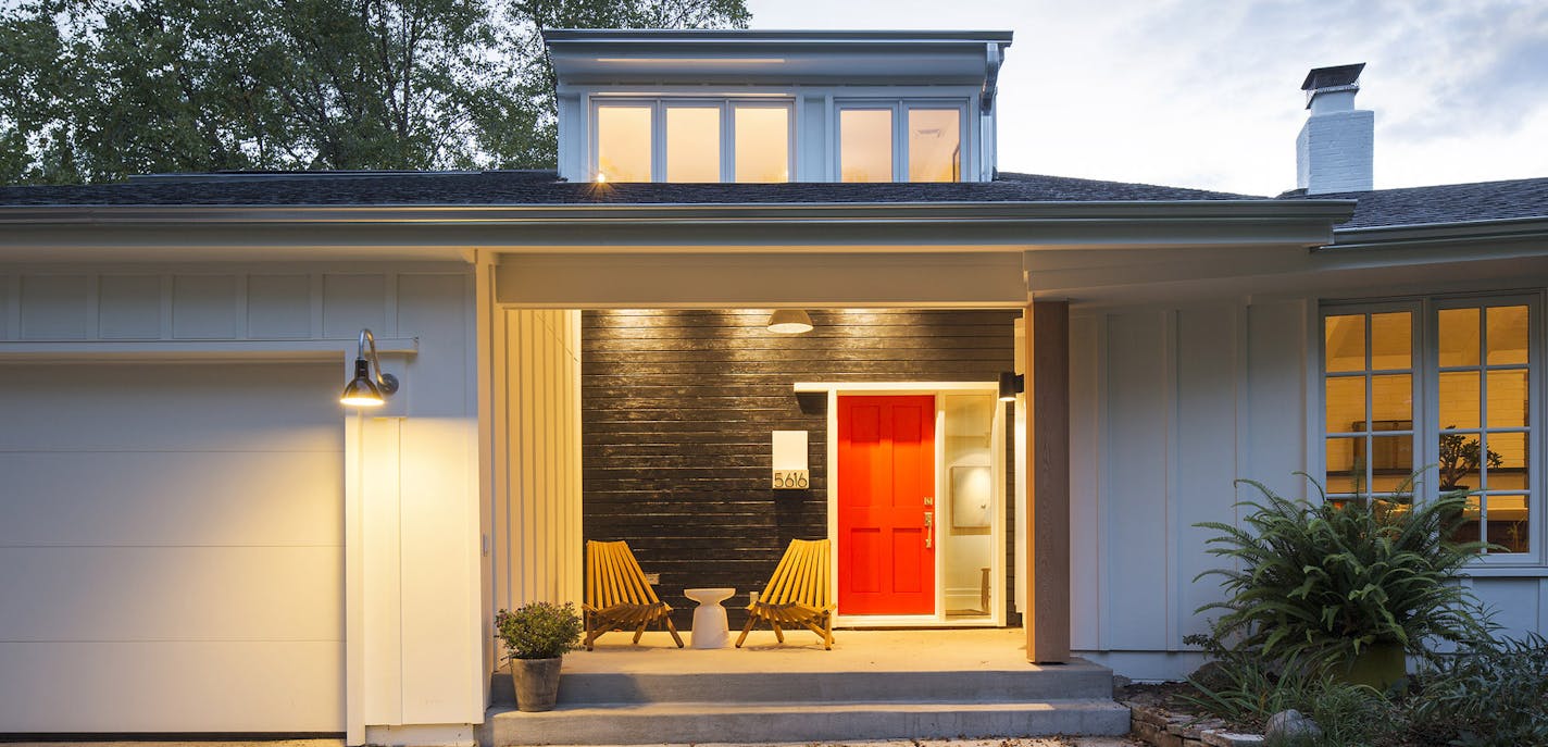 The redesigned front entry with charred wood paneling.