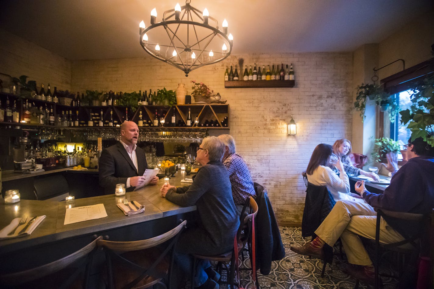 Chef JD Fratzke chatted with customers at the bar at Bar Brigade photographed on November 2, 2017, in St. Paul, Minn. ] RENEE JONES SCHNEIDER &#x2022; renee.jones@startribune.com