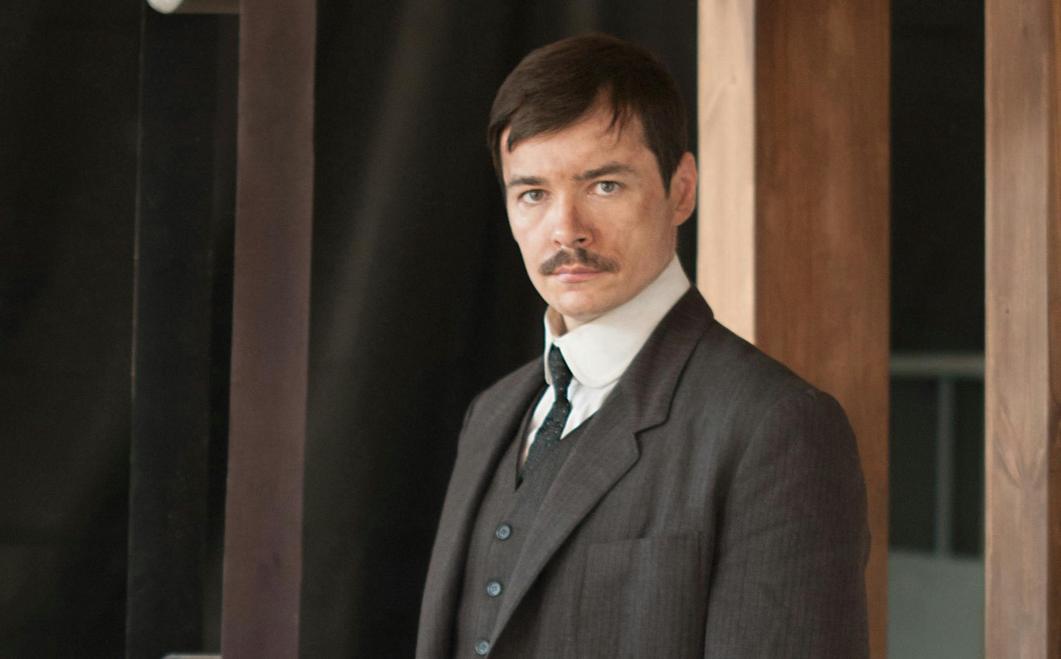 A reenactment of Orville Wright inside his bicycle workshop, where he and brother Wilbur spent years building and perfecting their airplanes.