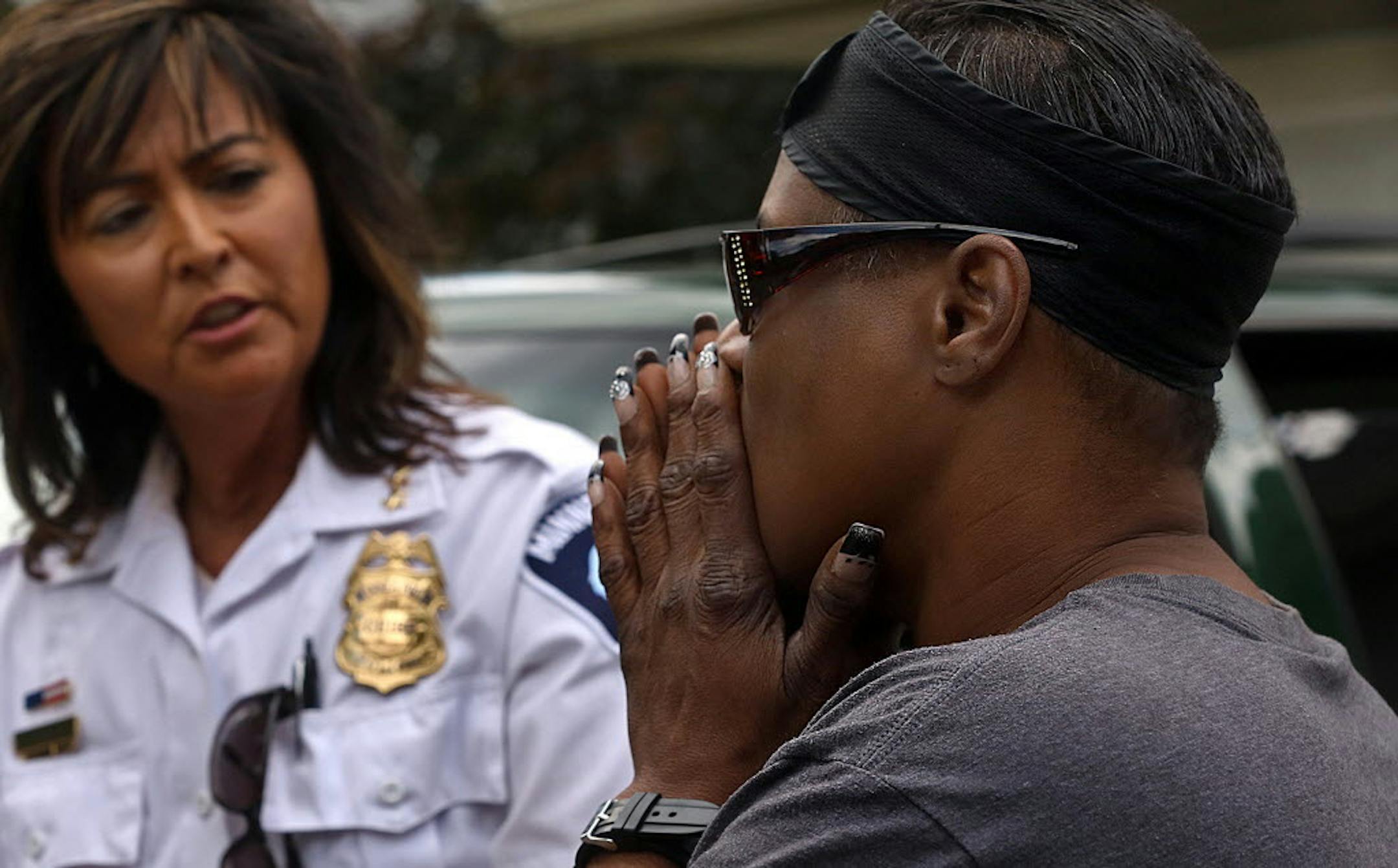 July 8, 2014: Chaujunha Dunigan talked to Minneapolis Police Chief Harteau about violence in her neighborhood.