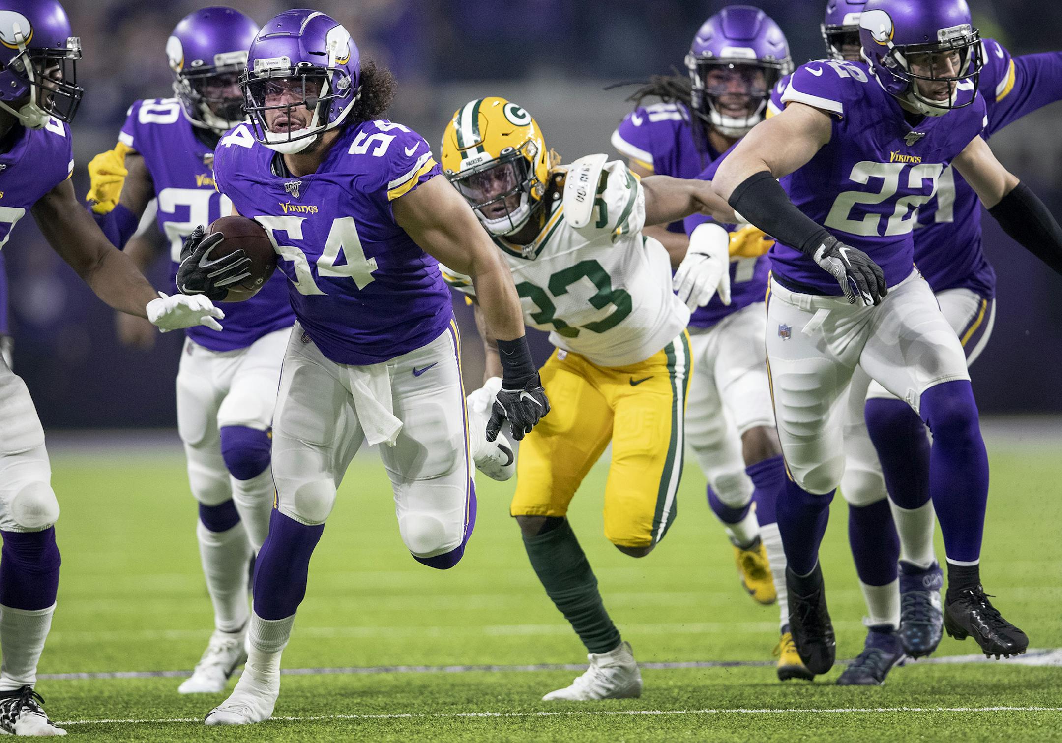 Minnesota Vikings linebacker Eric Kendricks (54) returns a fumble in the first quarter Monday, Dec. 23, 2019 at U.S. Bank Stadium in Minneapolis, Minn.
