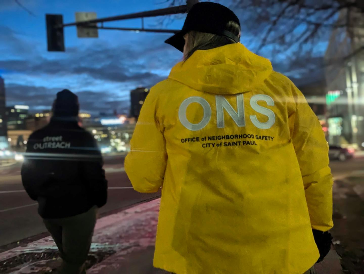 Sam Stoltz (left) and Chris Michels (right) patrol downtown St. Paul on Dec. 6 looking for unsheltered people in need of city services.