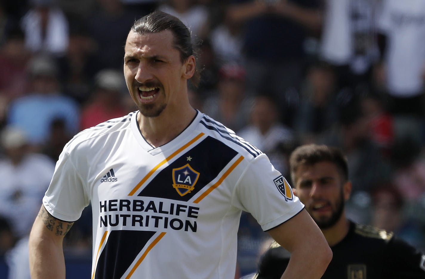 Galaxy forward Zlatan Ibrahimovic, left, enters the game in the 71st minute against LAFC on Saturday, Mar. 31, 2018, at StubHub Center in Carson, Calif. (Luis Sinco/Los Angeles Times/TNS) ORG XMIT: 1228040