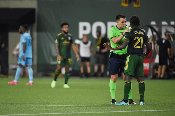 MLS investigating report of racial slur by Loons player at Portland star Chara