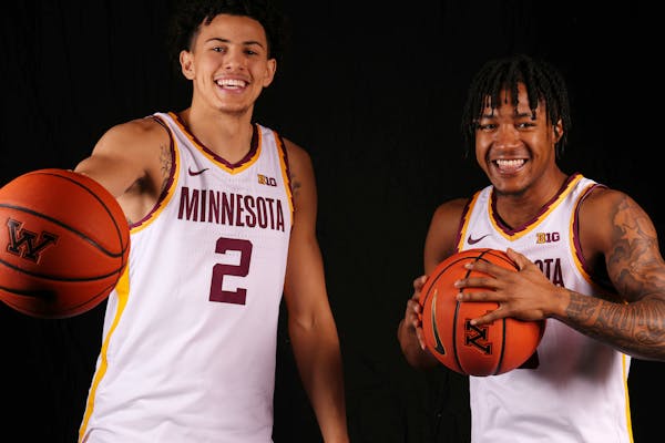 Gophers guards Mike Mitchell Jr. (2) and Elijah Hawkins (0) transferred into the program over the offseason and have given the team a big boost.
