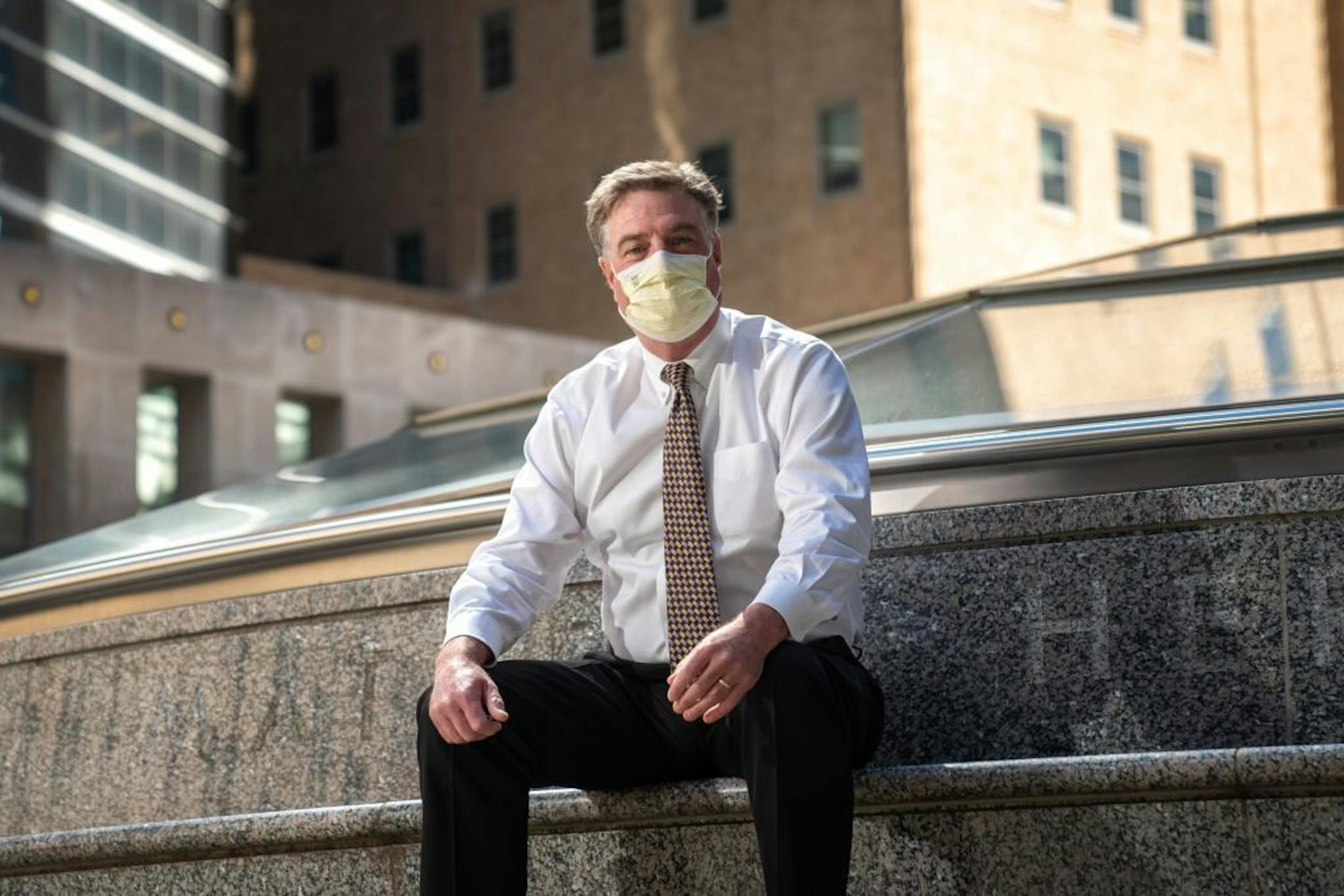 Dr. Andrew Badley outside the historic Plummer building on Mayo Clinic campus.