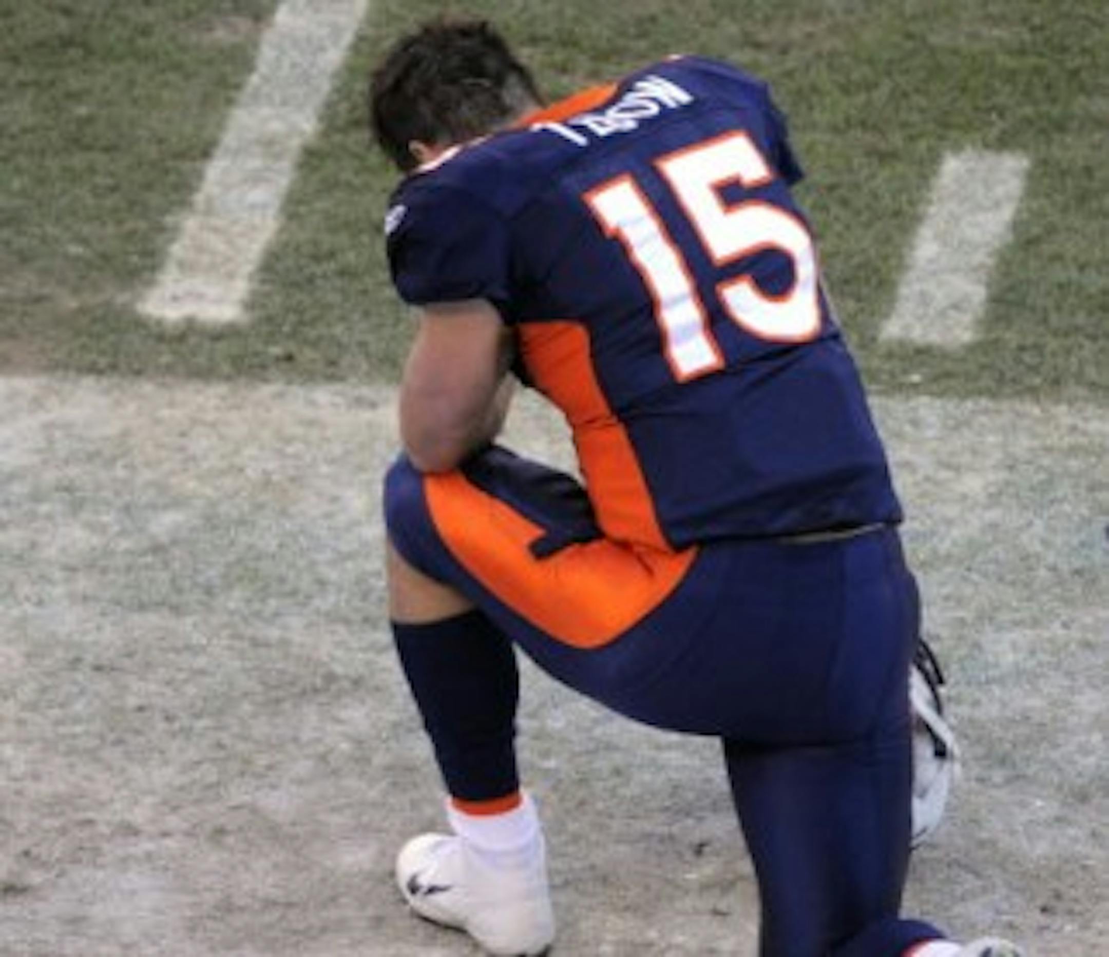 Brady Quinn is apologizing to Tim Tebow (pictured) for unflattering comments Quinn made about the Denver Broncos' starting quarterback in a GQ article.