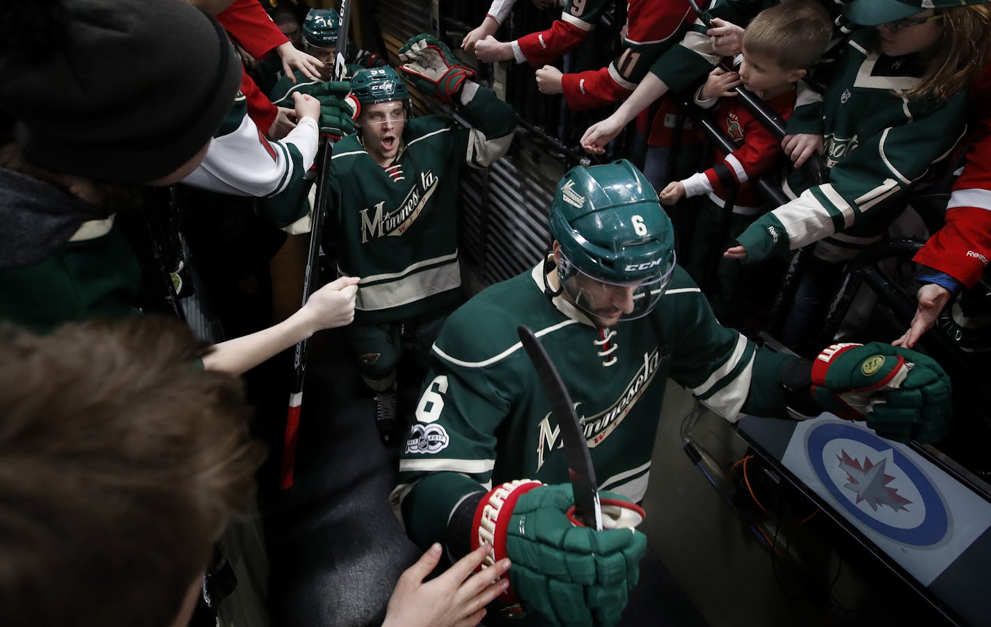 Marco Scandella (6) and Erik Haula (56) made their way to the ice for warm ups. ] CARLOS GONZALEZ &#xef; cgonzalez@startribune.com - April 12, 2017, St. Paul, MN, Xcel Energy Center, NHL, Stanley Cup Playoffs, Game 1, Minnesota Wild vs. St. Louis Blues