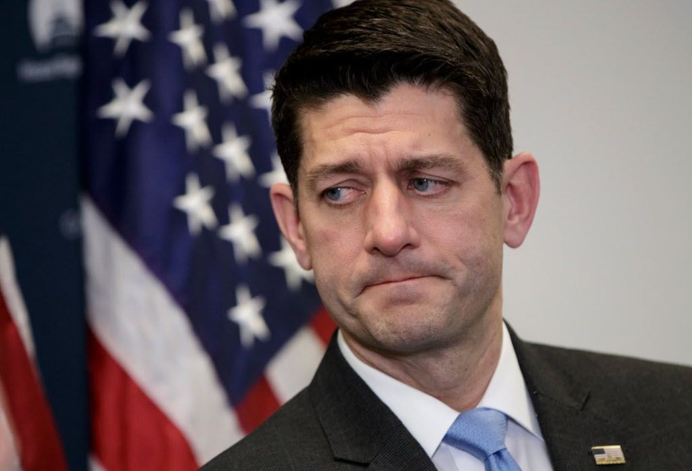 FILE - In this March 20,2018, file photo, House Speaker Paul Ryan of Wis., pauses as he speaks to reporters on Capitol Hill in Washington. Ryan's political future as House speaker has been such a topic of speculation that even the simple question of whether he will seek re-election to his Wisconsin seat remains secret.