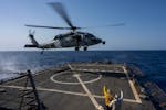 An HSC-7 helicopter lands on the Arleigh Burke-class guided missile destroyer USS Laboon in the Red Sea, Wednesday on June 12, 2024.