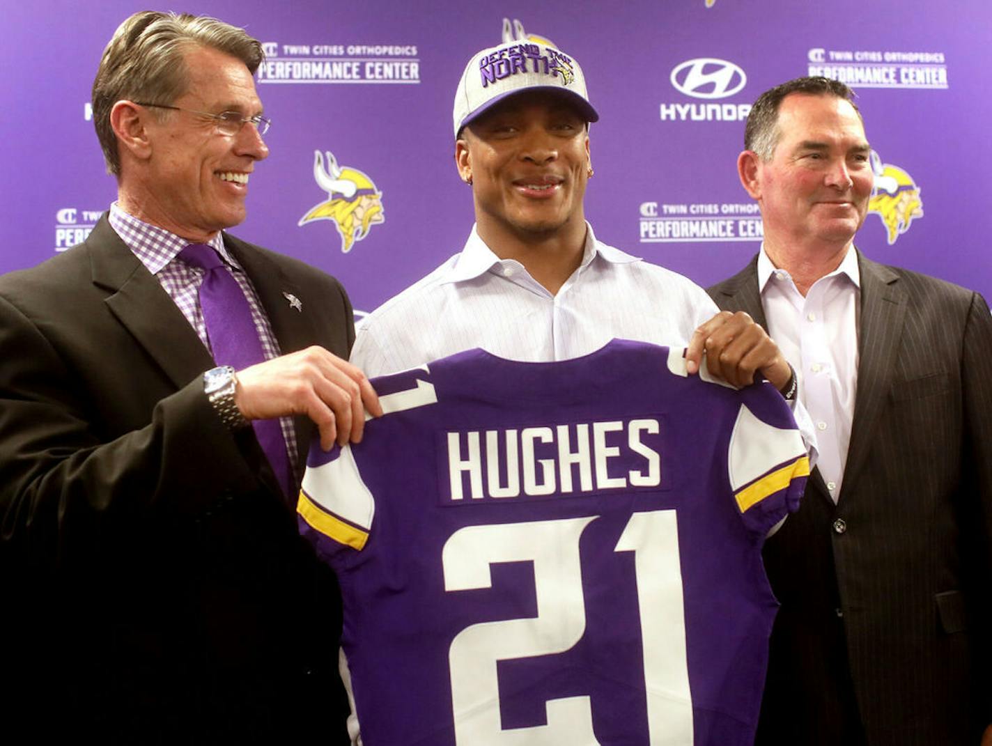 Minnesota Vikings first round pick cornerback Mike Hughes from the University of Central Florida, with Vikings general manager Rick Spielman, left, and Vikings head coach Mike Zimmer, right, was introduced to local media members Friday, April 27, 2018, at the Twin Cities Orthopedics Media Center.]