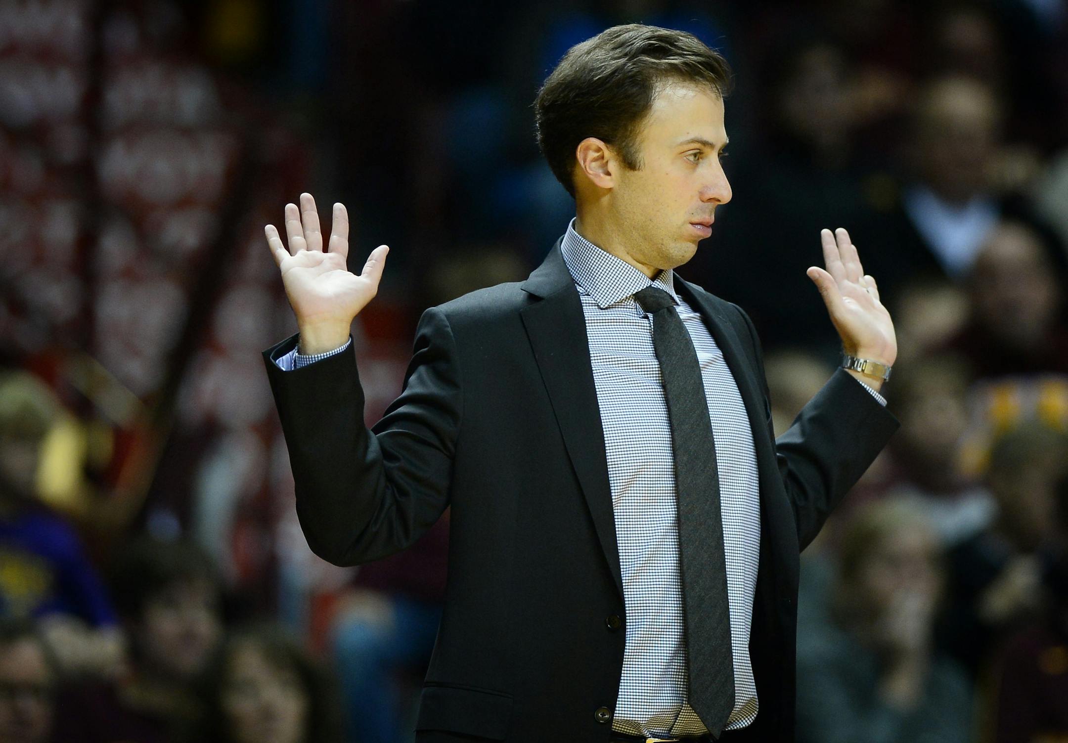 Minnesota Gophers head coach Richard Pitino gestured after nearly colliding with a Southwest Minnesota State player on Friday, Nov. 6, 2015.