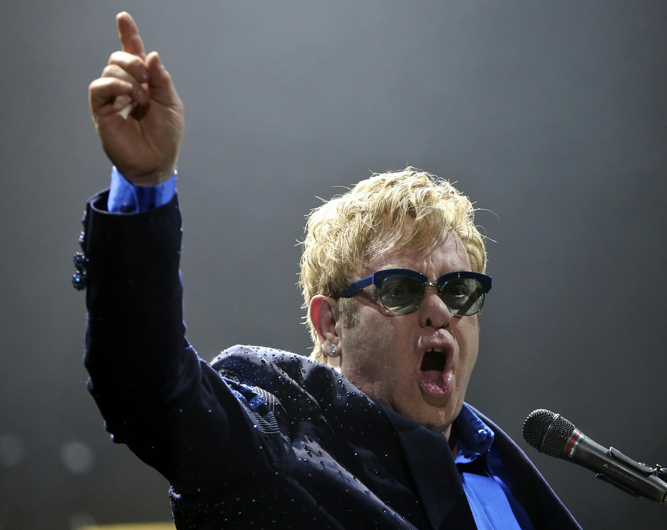 Pop giant Elton John performed Friday, Nov. 22, 2013, at the Xcel Energy Center in St. Paul, MN.](DAVID JOLES/STARTRIBUNE) djoles@startribune.com Pop giant Elton John played the Xcel Energy Center in St. Paul, MN.