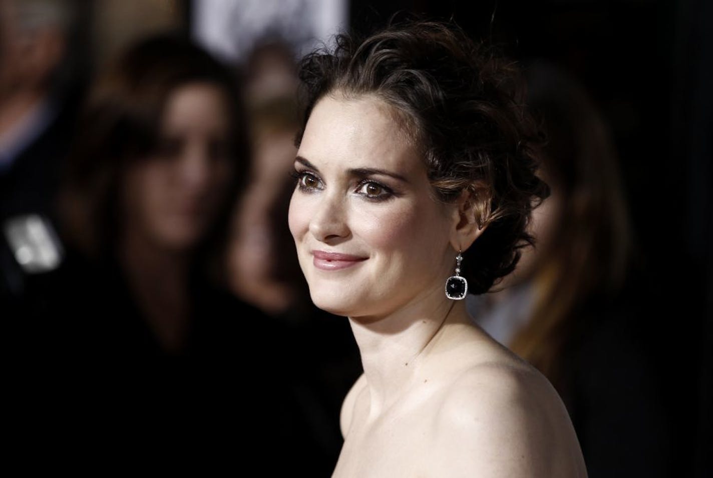 Cast member Winona Ryder arrives at a screening of "Black Swan" on the closing night of American Film Institute's AFI Fest 2010 in Los Angeles on Thursday, Nov. 11, 2010.