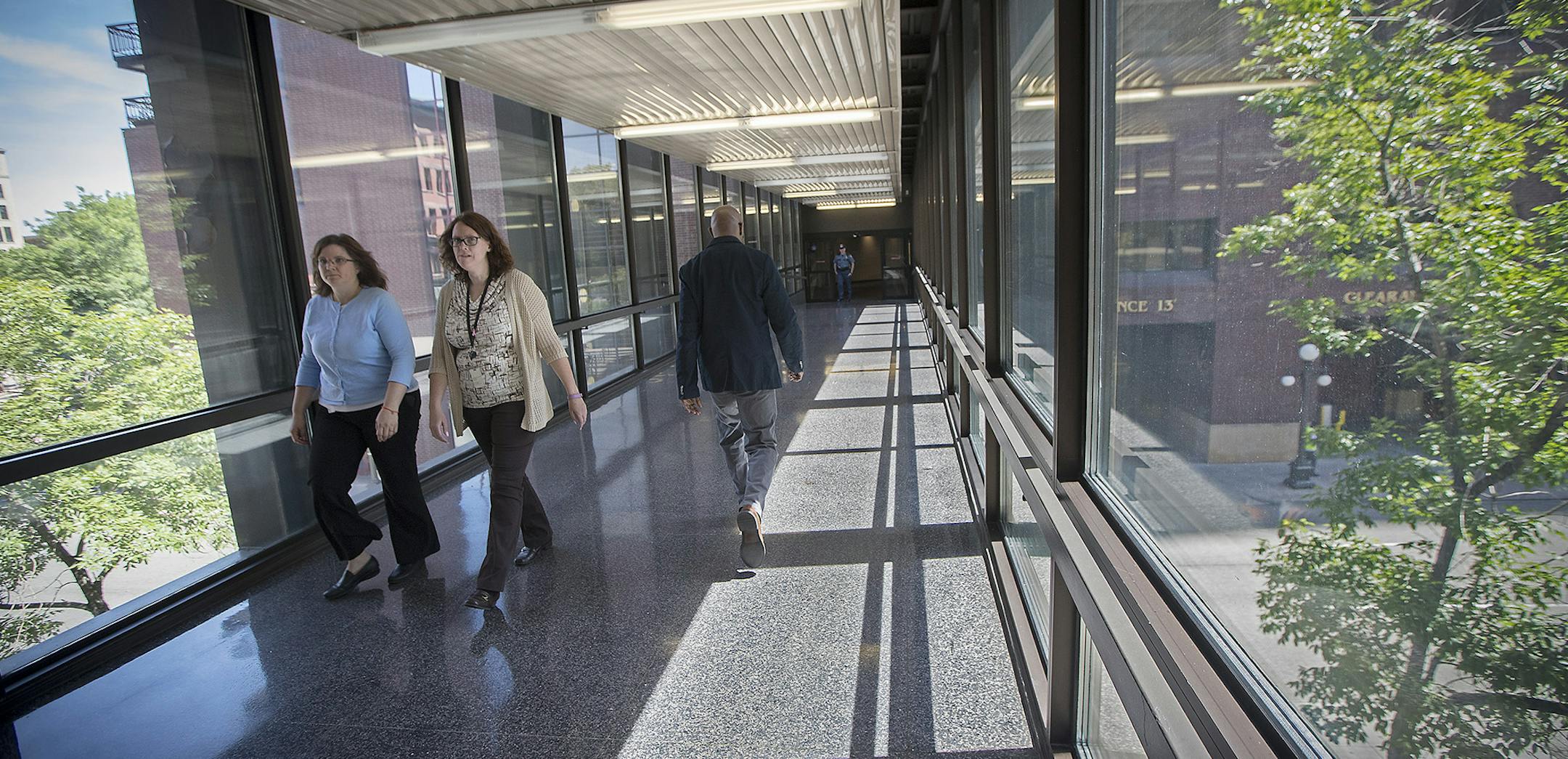 Pedestrians made their way through a skyway in the Mears Park area, Wednesday, June 7, 2017 in St. Paul, MN. The city will consider Brooks' request to close her skyway earlier at Wednesday's council meeting. ] ELIZABETH FLORES ï liz.flores@startribune.com ORG XMIT: MIN1706071533562640