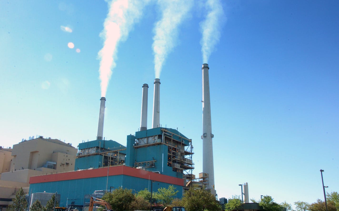 Smoke rises from the Colstrip Steam Electric Station in Colstrip, Mont., Monday, July 1, 2013. President Barack Obama's climate change plan calls for limits on carbon dioxide emissions from coal-burning power plants like the Colstrip Steam Electric Station. The plant, which employs 388 people, emits an estimated 17 million tons of carbon dioxide annually. (AP Photo/Matthew Brown)