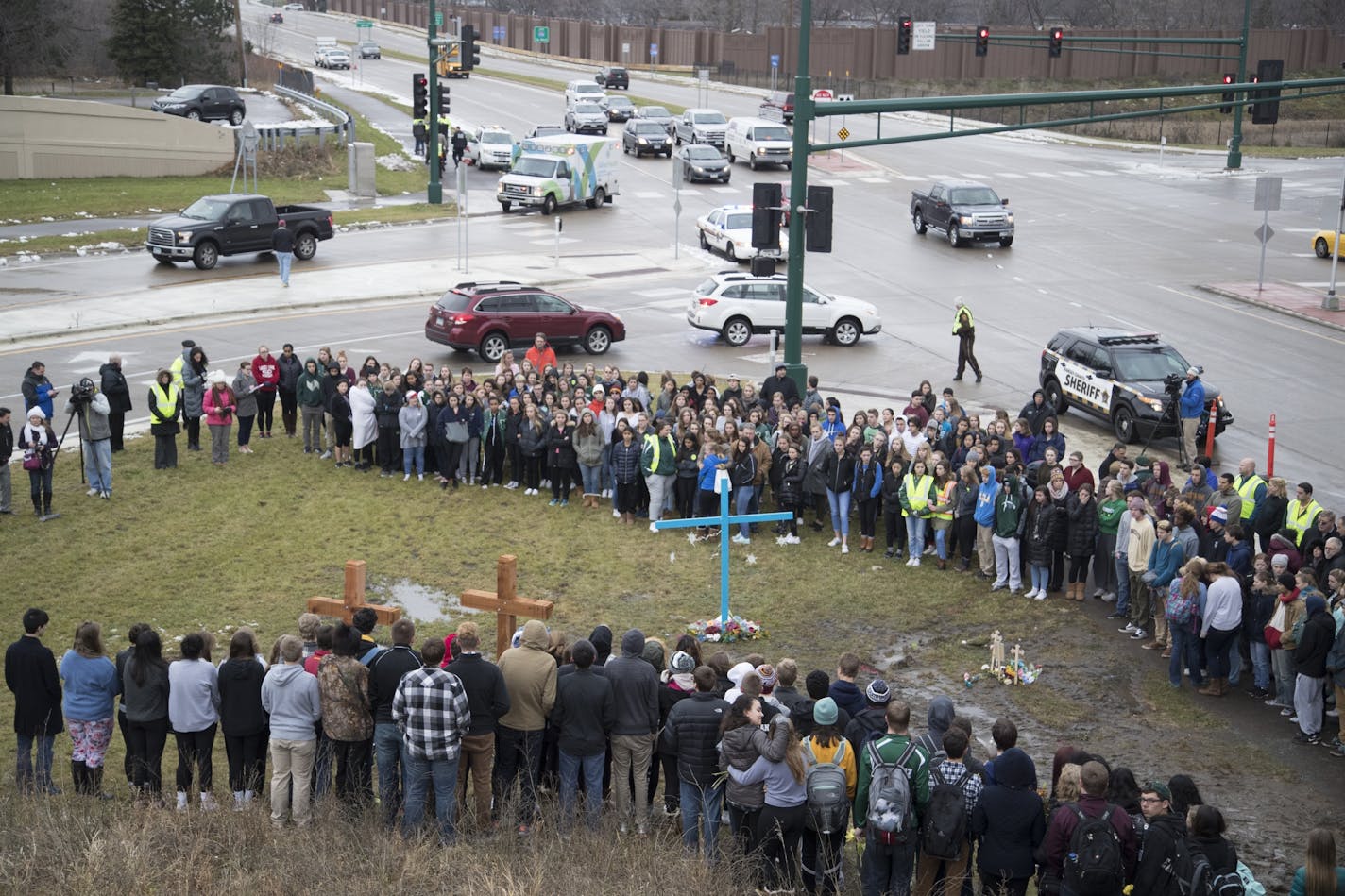 Students from Mounds View High school gathered at the crash scene along hwy 96 where they left memorials for two students that were killed in a traffic accident December 05,2016 in Mounds View, MN.