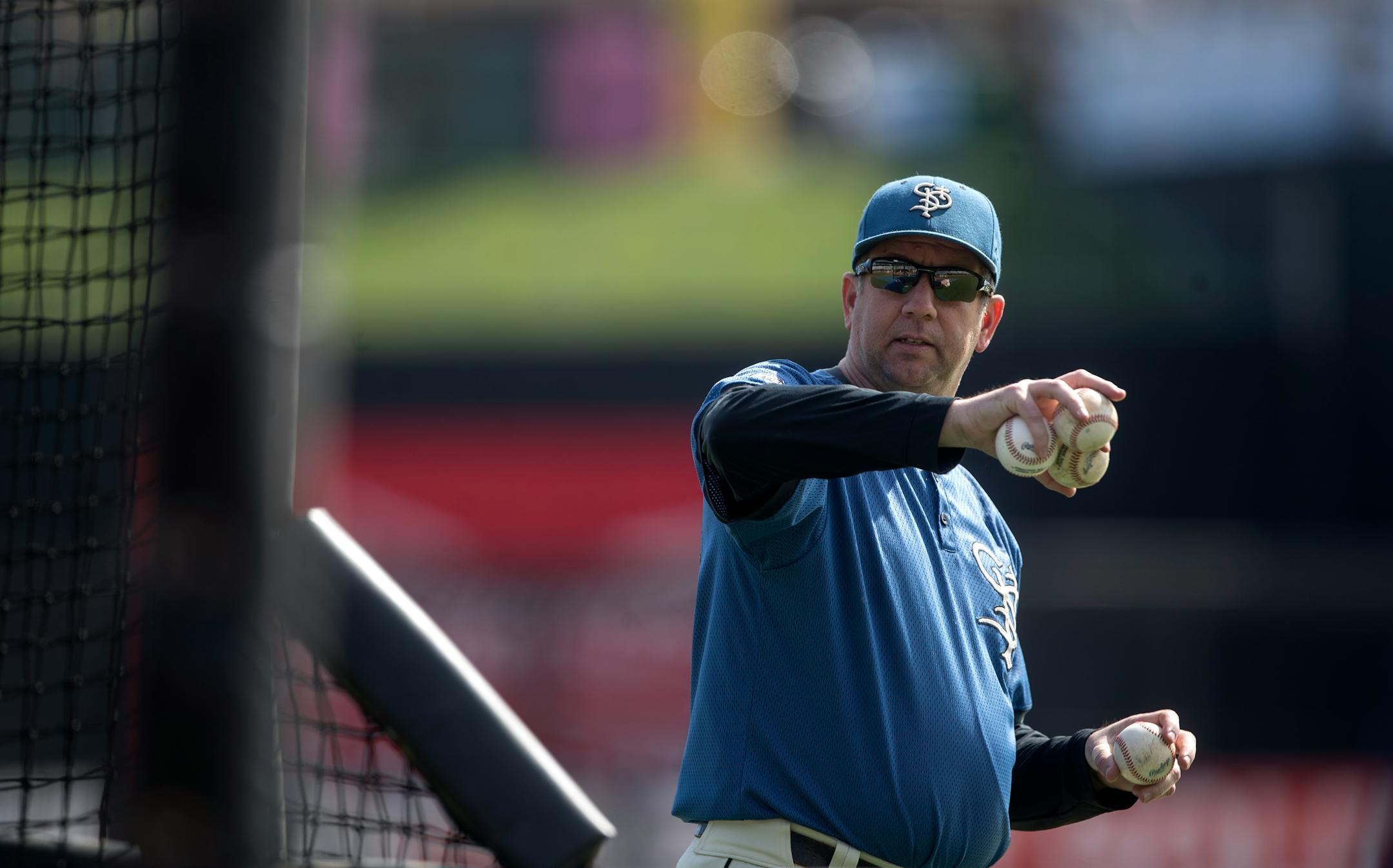 George Tsamis threw batting practice to Saints players at CHS Field.