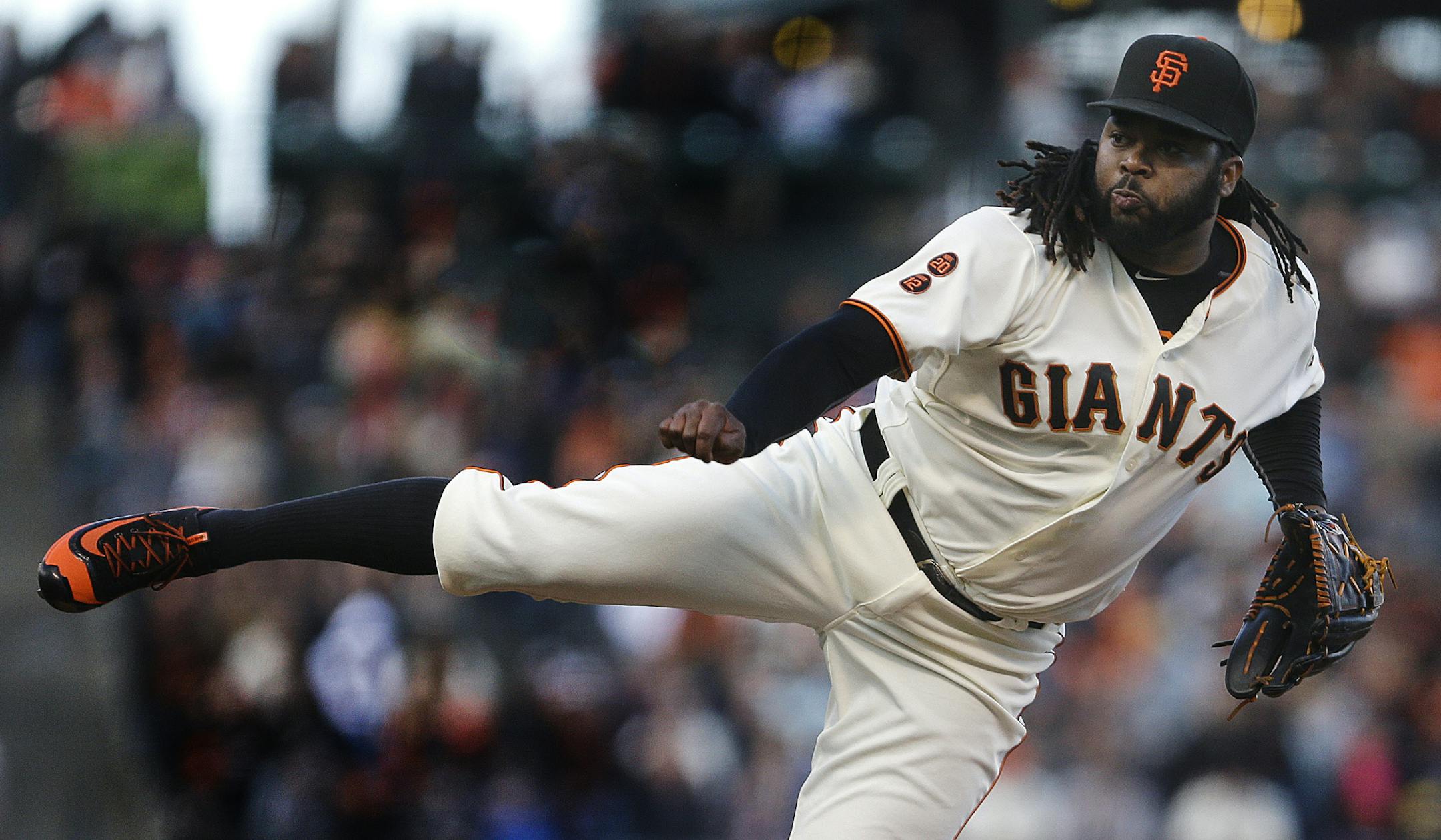 San Francisco Giants pitcher Johnny Cueto works against the Colorado Rockies in the first inning of a baseball game Wednesday, July 6, 2016, in San Francisco. (AP Photo/Ben Margot)