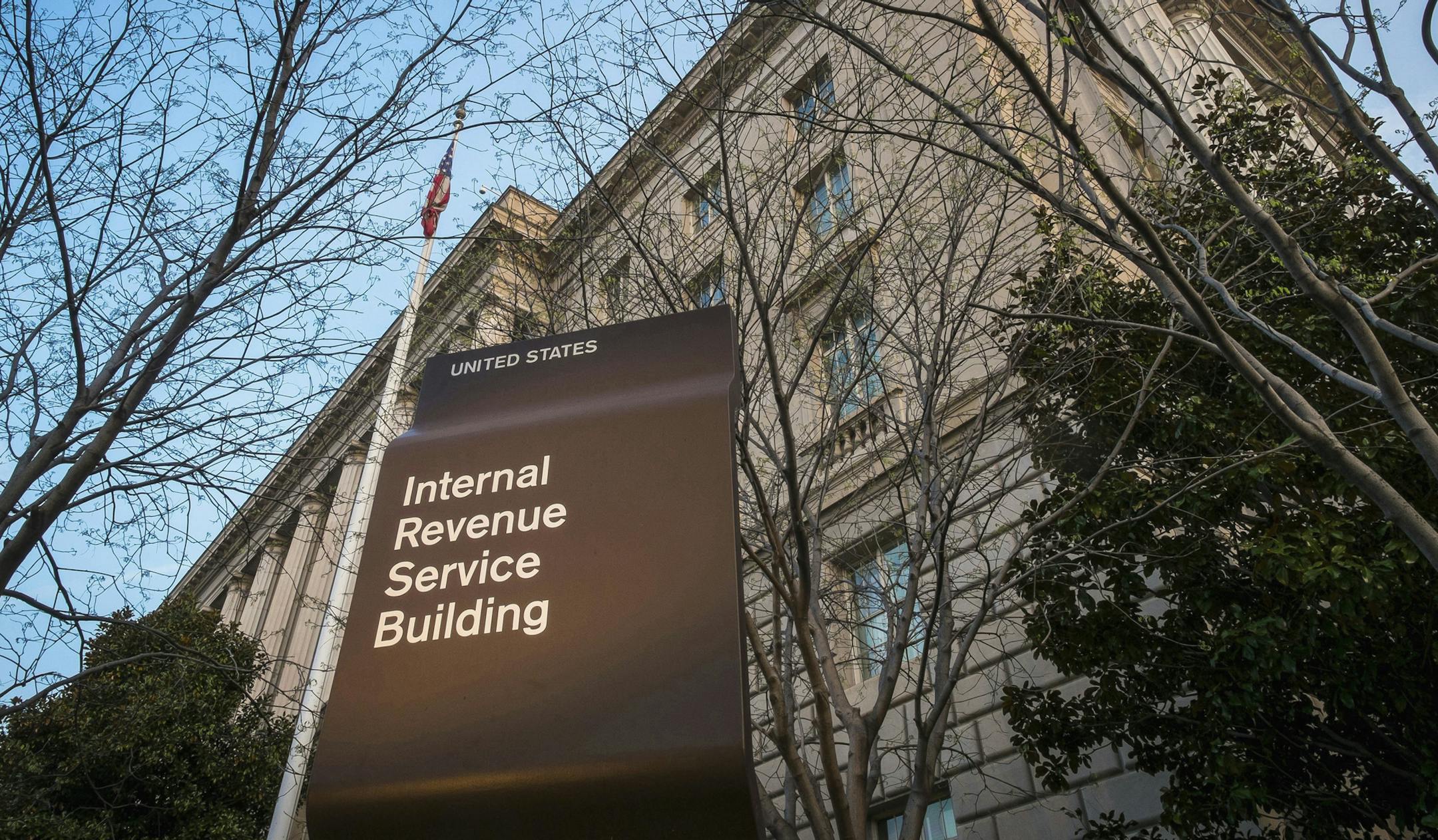 FILE - This April 13, 2014, file photo shows the Internal Revenue Service (IRS) headquarters building in Washington. 2019 was another tough year for the IRS, according to a new federal report. Burdened with years of budget cuts and a recent increase in workload to implement a new tax law, the IRS struggled to deliver on its mission in the past fiscal year. The annual report from the Office of Taxpayer Advocate found that in the 2019 fiscal year, among other problems, the agency failed to collect