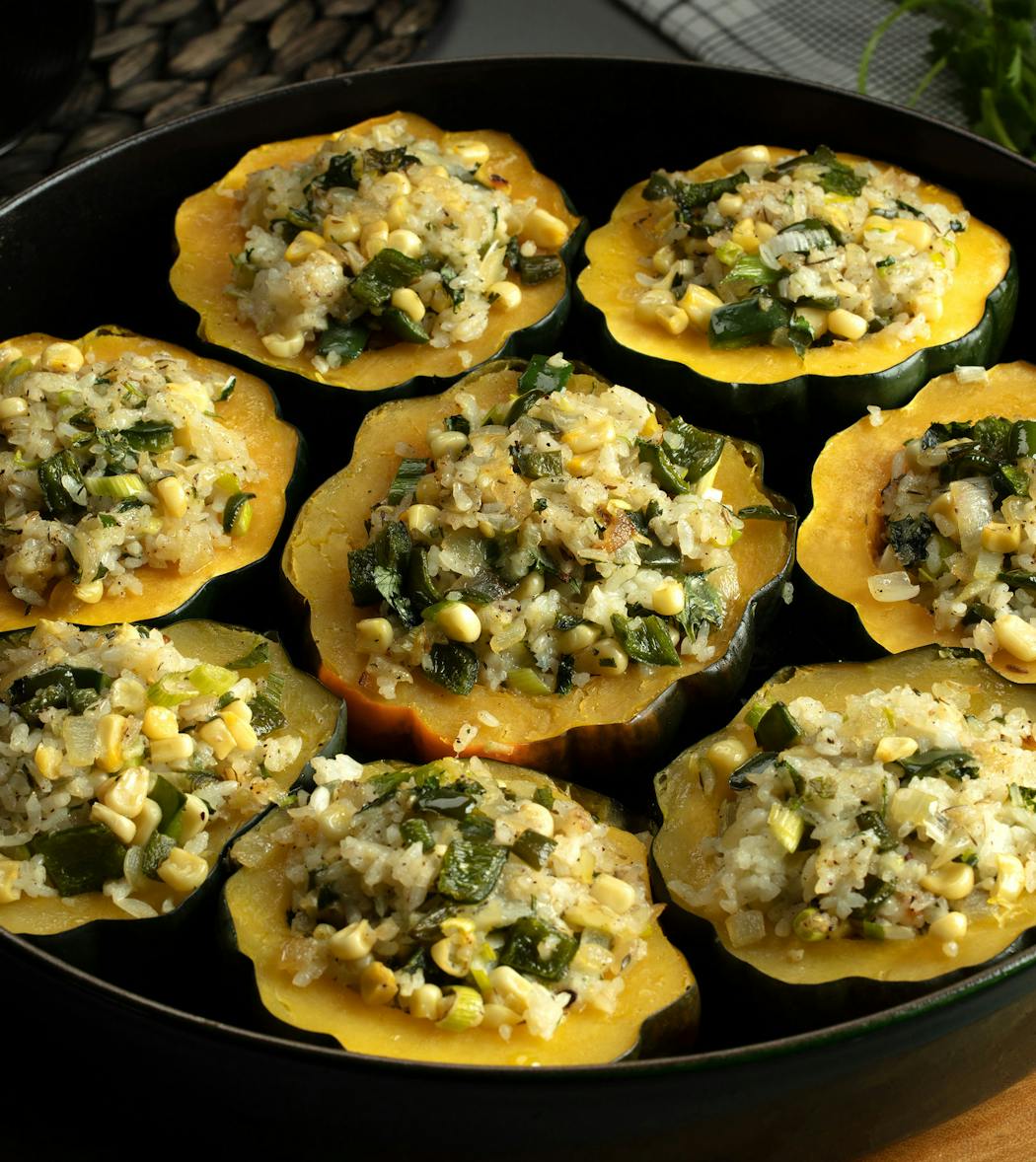 Acorn Squash With Cheesy Rice and Poblanos works as side or main dish.