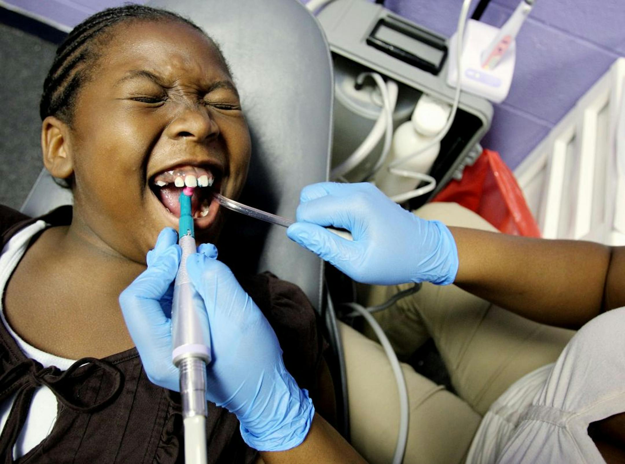 Heavenlea James, 9, has her teeth cleaned at Christ Community Health Services in Memphis, Tenn.