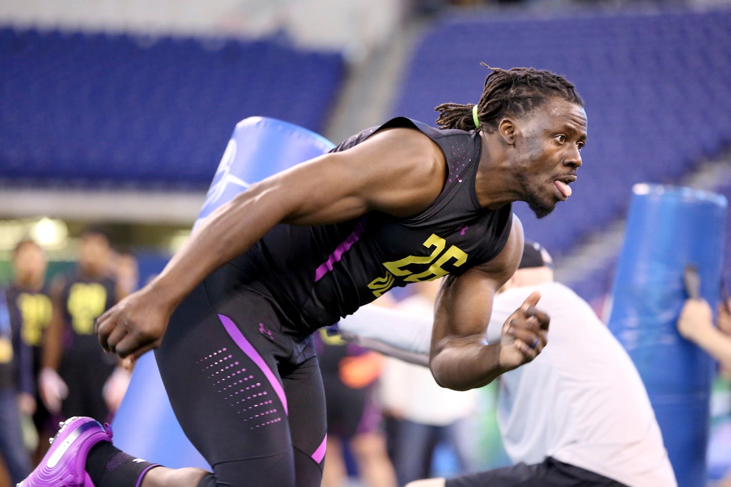 Tulane defensive lineman Ade Aruna performs in a drill seen at the 2018 NFL Scouting Combine on Sunday, March 4, 2018, in Indianapolis. (AP Photo/Gregory Payan)