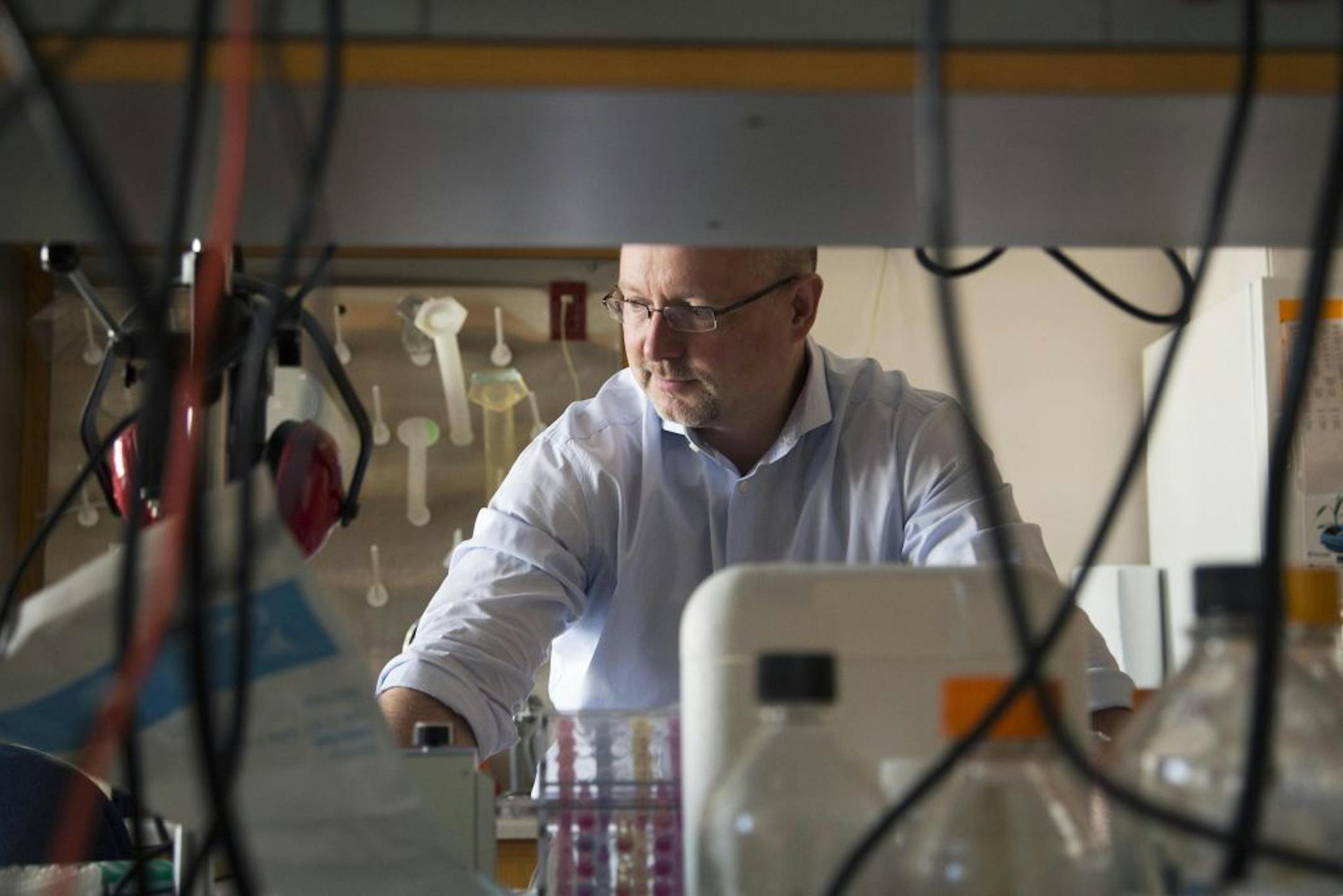 This Aug. 8, 2013 photo provided by Duke University shows Dr. Matthias Gromeier at his laboratory at Duke in Durham, N.C. Gromeier developed a modified poliovirus to attack glioblastoma brain tumor cells. One of the world's most dreaded viruses has been turned into an immune system therapy to fight deadly brain tumors. Survival was better than expected for patients in a small study treated with the modified poliovirus, which helped their bodies attack their cancer, doctors reported on Tuesday, J