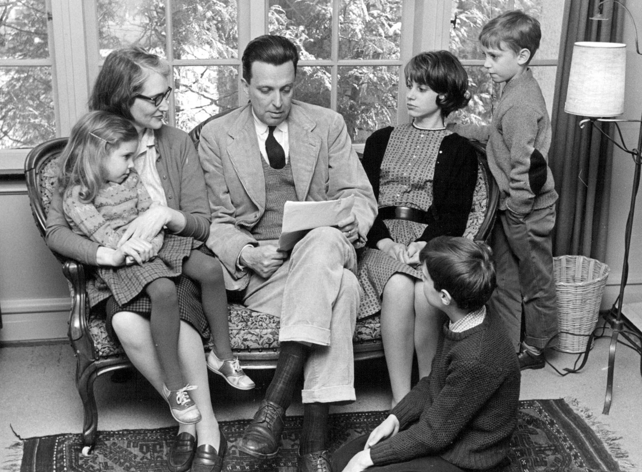 Author J.F. Powers and family. Jane, 4 on Betty's lap. Mary, 13, Hugh 7, James 8, is kneeling. Star Tribune file by Donald Black