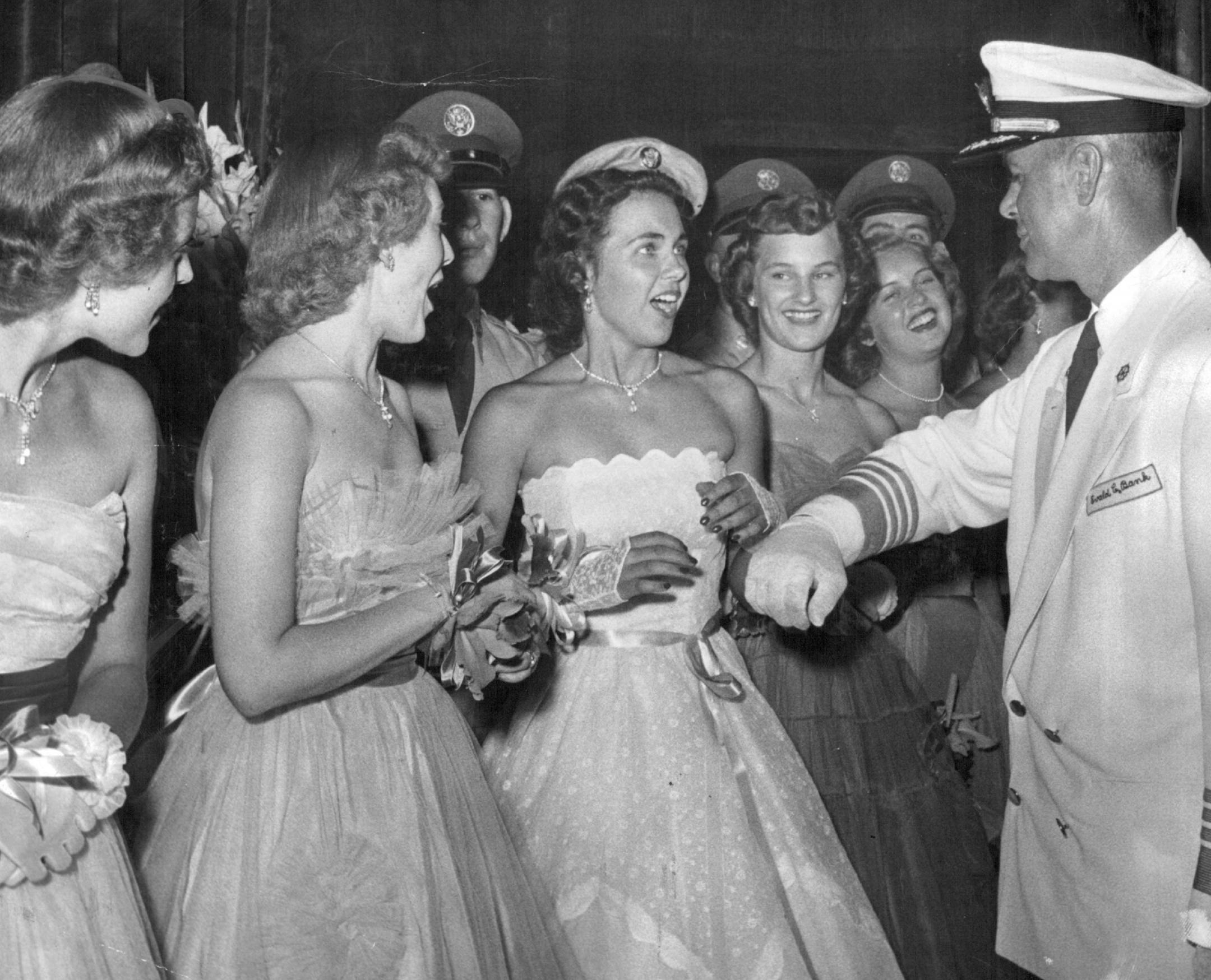 June 10, 1955: First tremendous thrill of Betty Barnhart's reign as new Aquatennial Queen of the Lakes came when Commodore Evald Bank stopped in front of her on the Minneapolis Auditorium stage Friday night and held out his arm. Then it was she knew she was it.