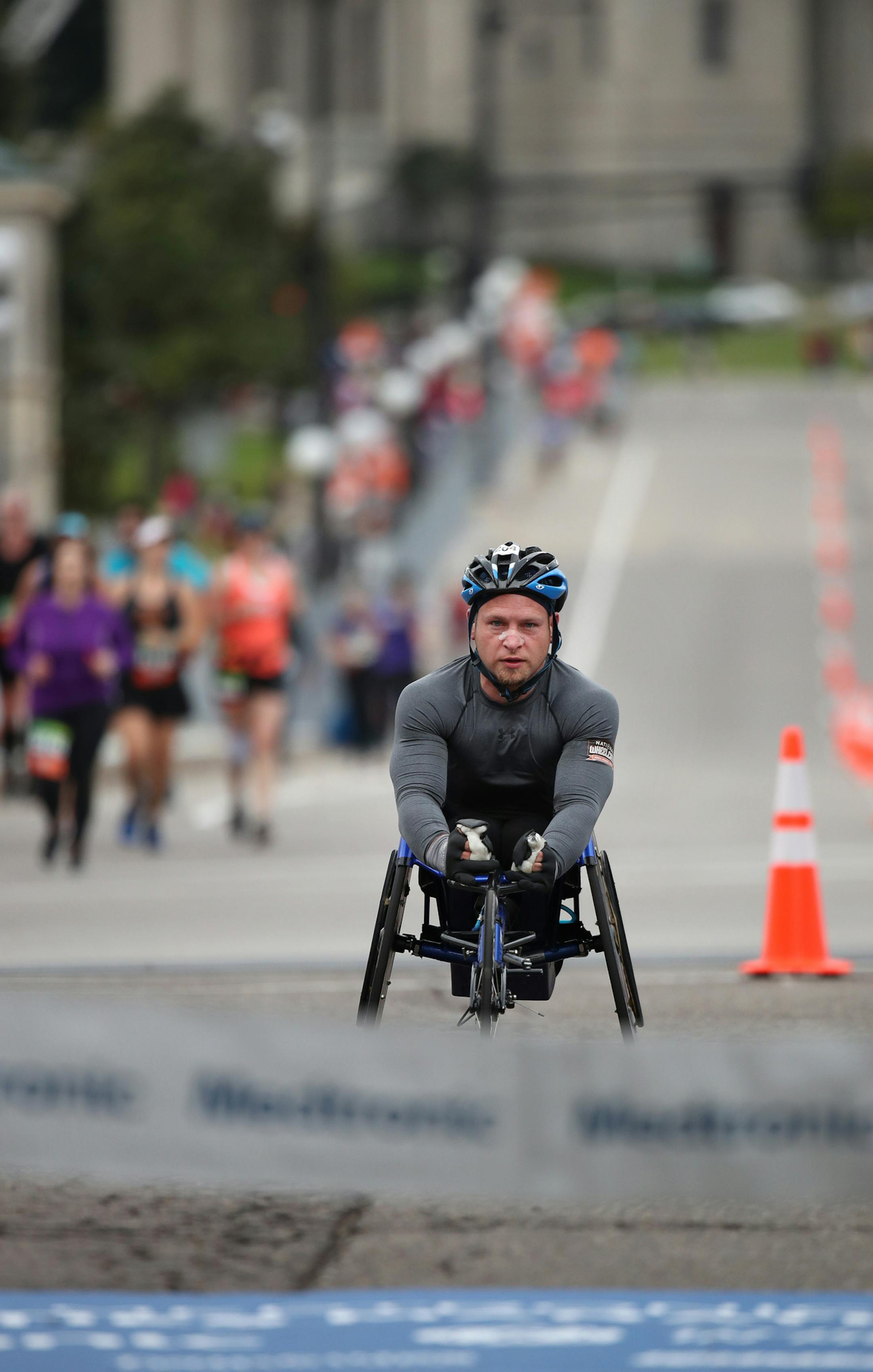 Matthew Porterfield won the wheelchair event asa he approached the finish line at the Capitol of the Twins Cities Marathon Sunday October 1,2017 in St. Paul, MN. ] JERRY HOLT ï jerry.holt@startribune.com Jerry Holt