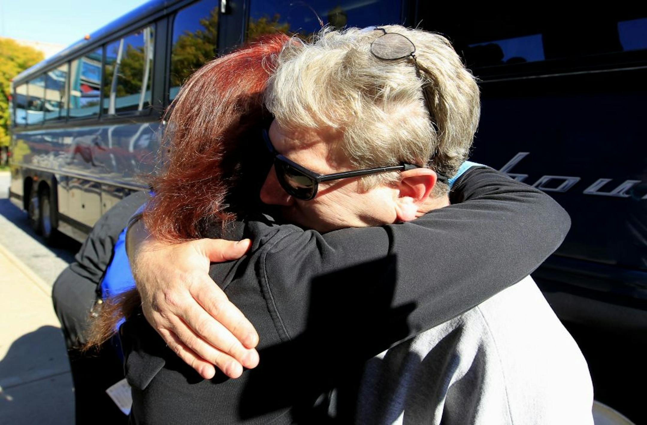 Darryl Flood got a hug from his sister in Woodbridge, Va., on Wednesday after he got out of prison two years earlier than expected.