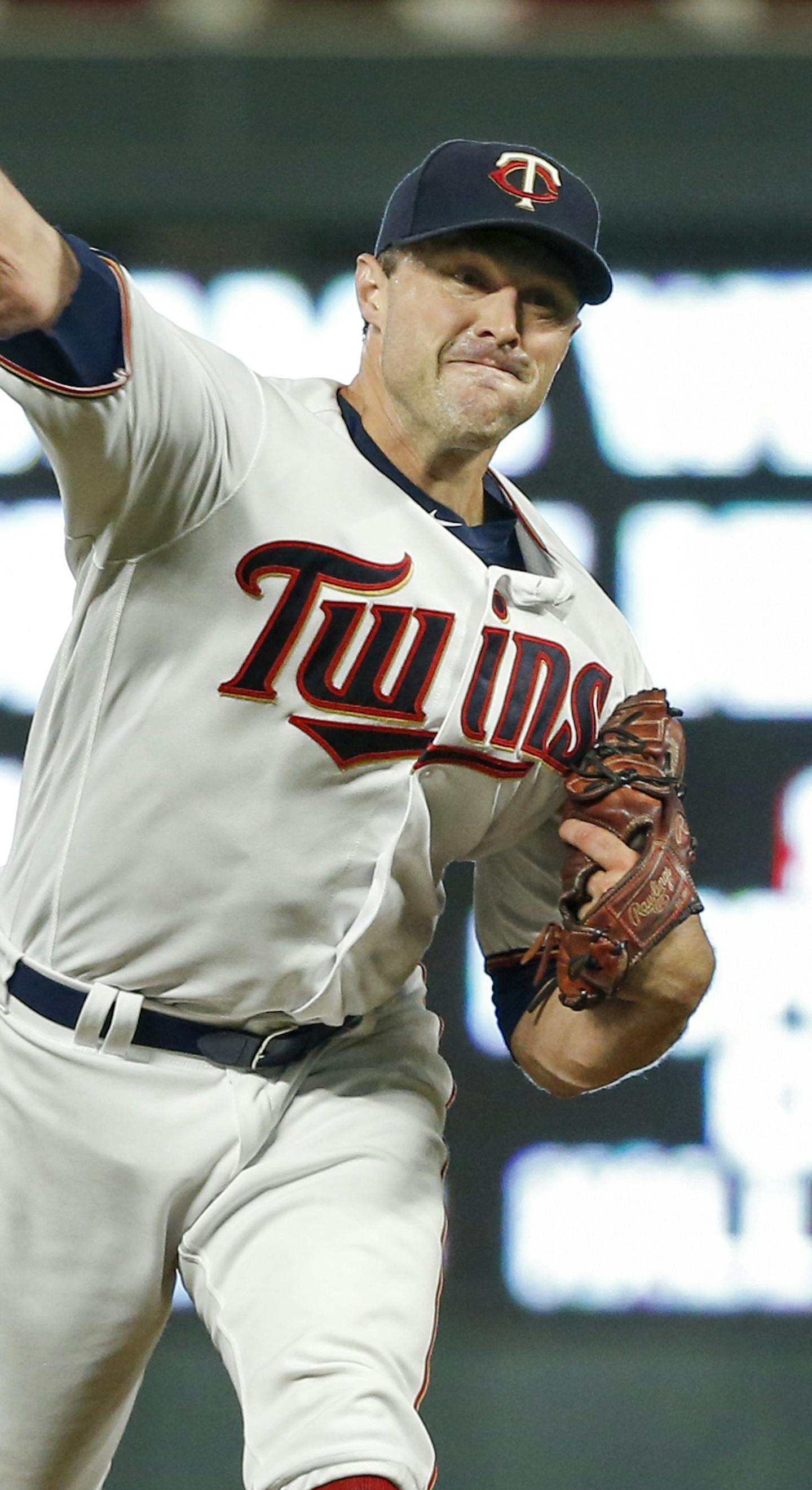 Minnesota Twins relief pitcher Matt Belisle throws to the Milwaukee Brewers in the ninth inning of a baseball game Monday, Aug. 7, 2017, in Minneapolis. The Twins won 5-4 and Belisle earned a save. (AP Photo/Bruce Kluckhohn)