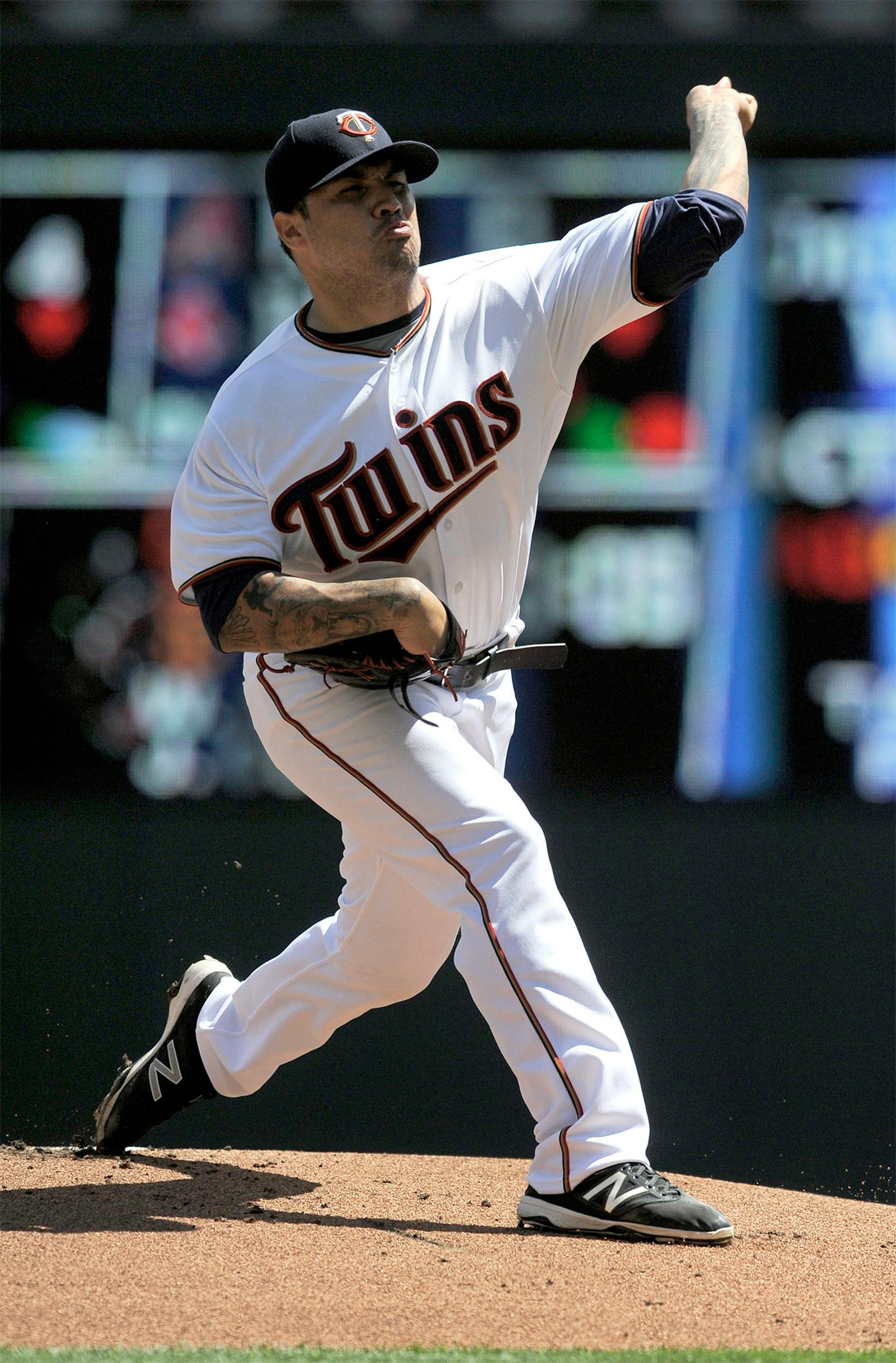 Minnesota Twins pitcher Hector Santiago throws against the Kansas City Royals in the first inning Sunday, Aug. 14, 2016, in Minneapolis.