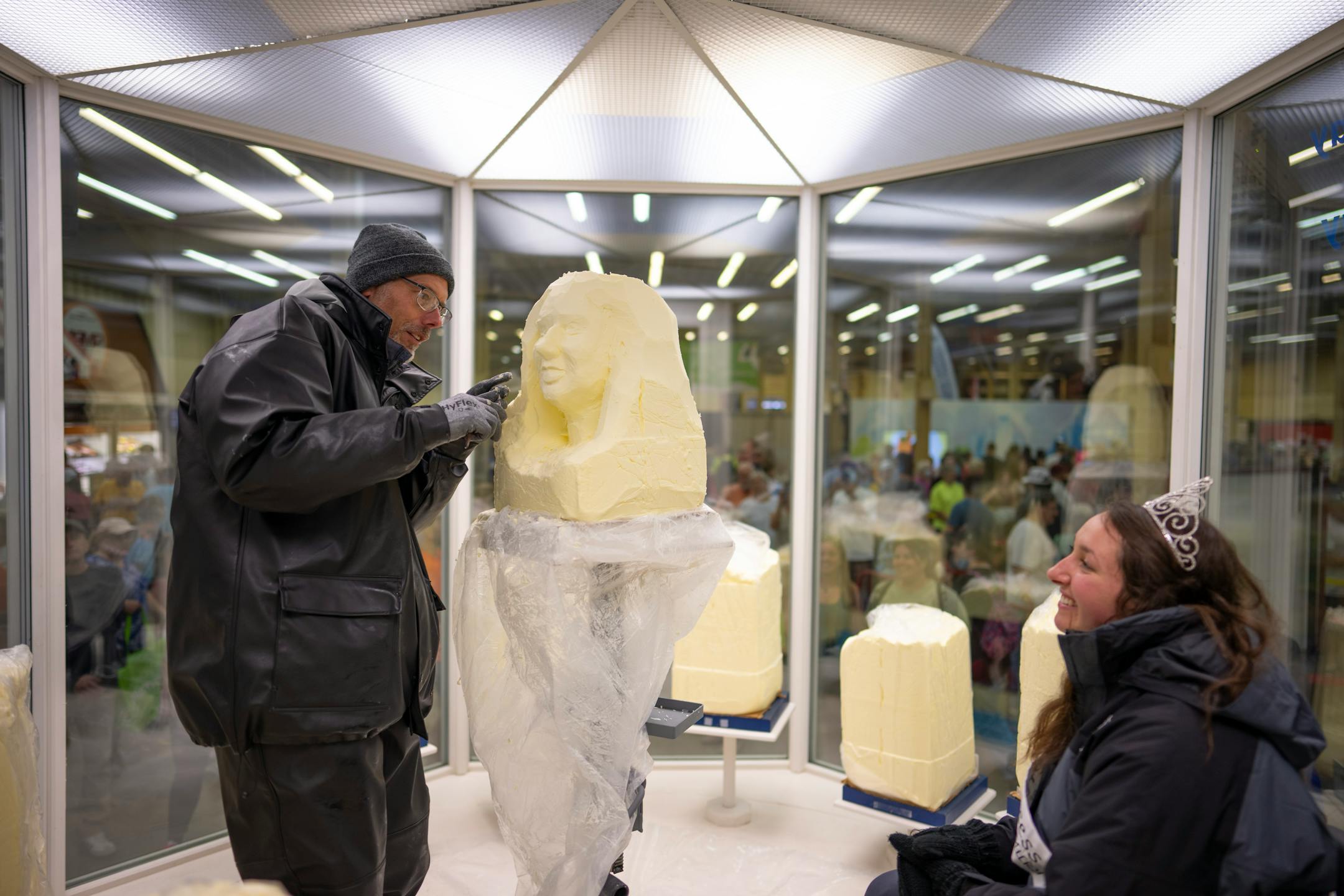 Gerry Kulzer worked on sculpting the likeness of Rachel Rynda, the 69th Princess Kay of the Milky Way out of a 90 lb. block of butter Thursday afternoon in the Dairy Building on the first day of the Minnesota State Fair.