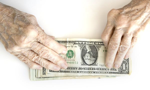 Old hand and money